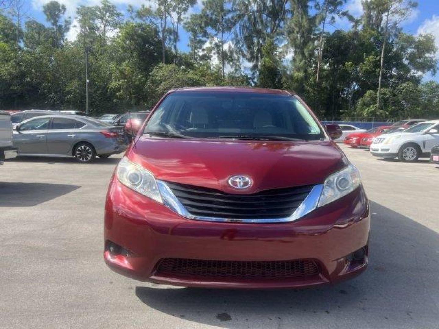 2011 Red Toyota Sienna Base (5TDKK3DC2BS) with an 6 3.5L engine, Automatic transmission, located at 27610 S Dixie Hwy, Homestead, FL, 33032, (305) 749-2348, 25.510241, -80.438301 - IIHS Top Safety Pick. Only 81,190 Miles! Scores 24 Highway MPG and 18 City MPG! This Toyota Sienna boasts a Gas V6 3.5L/211 engine powering this Automatic transmission. XM satellite radio (subscription required), Washer-linked variable intermittent wipers -inc: de-icer grid, Vehicle stability contro - Photo#2