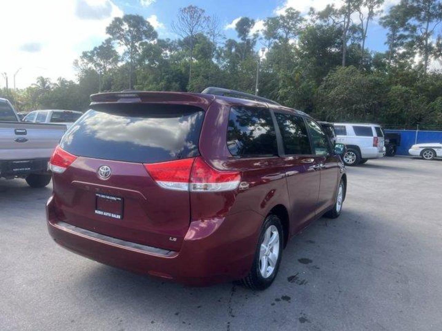 2011 Red Toyota Sienna Base (5TDKK3DC2BS) with an 6 3.5L engine, Automatic transmission, located at 27610 S Dixie Hwy, Homestead, FL, 33032, (305) 749-2348, 25.510241, -80.438301 - IIHS Top Safety Pick. Only 81,190 Miles! Scores 24 Highway MPG and 18 City MPG! This Toyota Sienna boasts a Gas V6 3.5L/211 engine powering this Automatic transmission. XM satellite radio (subscription required), Washer-linked variable intermittent wipers -inc: de-icer grid, Vehicle stability contro - Photo#5