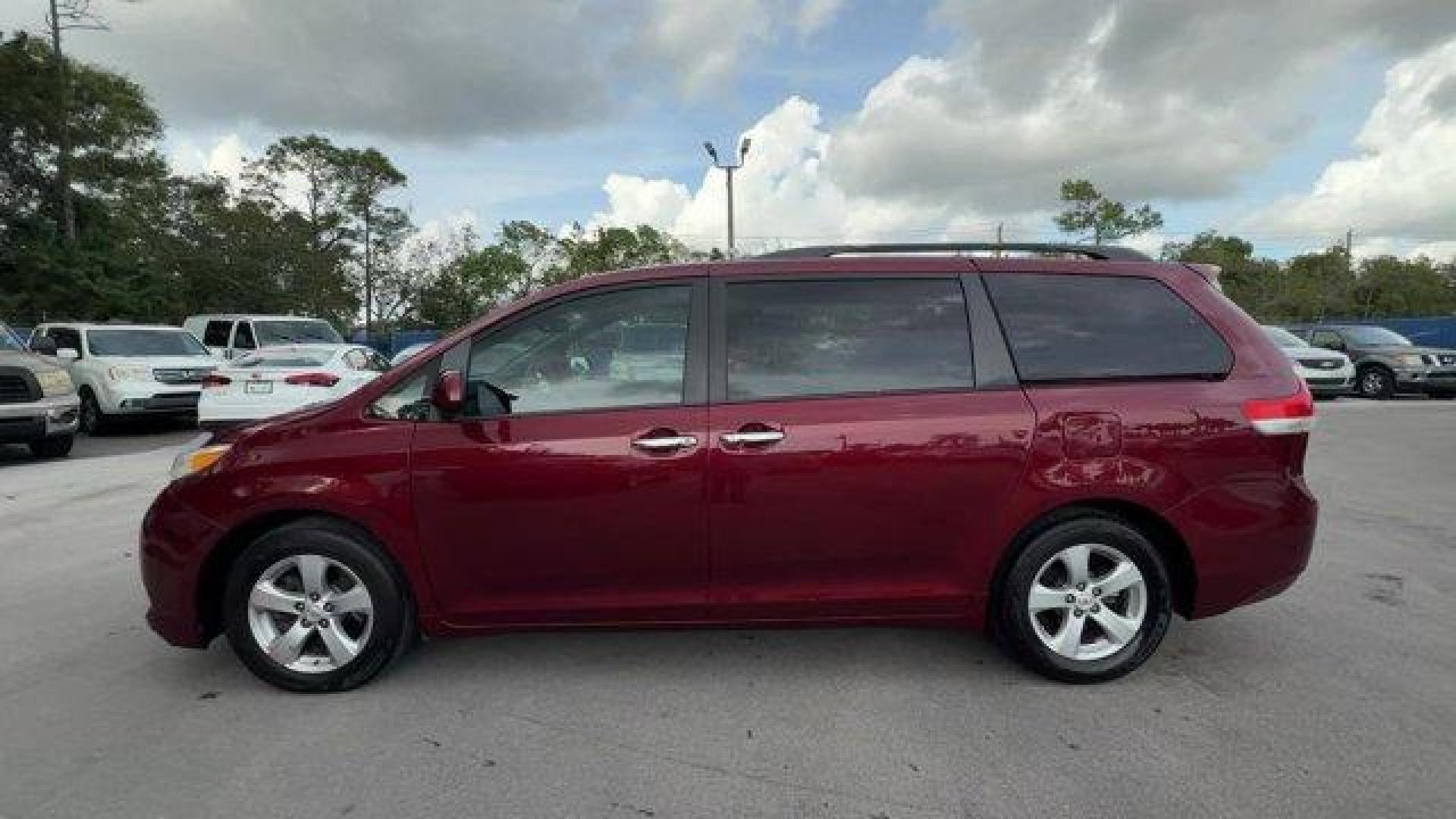 2011 Red Toyota Sienna Base (5TDKK3DC2BS) with an 6 3.5L engine, Automatic transmission, located at 27610 S Dixie Hwy, Homestead, FL, 33032, (305) 749-2348, 25.510241, -80.438301 - IIHS Top Safety Pick. Only 81,190 Miles! Scores 24 Highway MPG and 18 City MPG! This Toyota Sienna boasts a Gas V6 3.5L/211 engine powering this Automatic transmission. XM satellite radio (subscription required), Washer-linked variable intermittent wipers -inc: de-icer grid, Vehicle stability contro - Photo#1