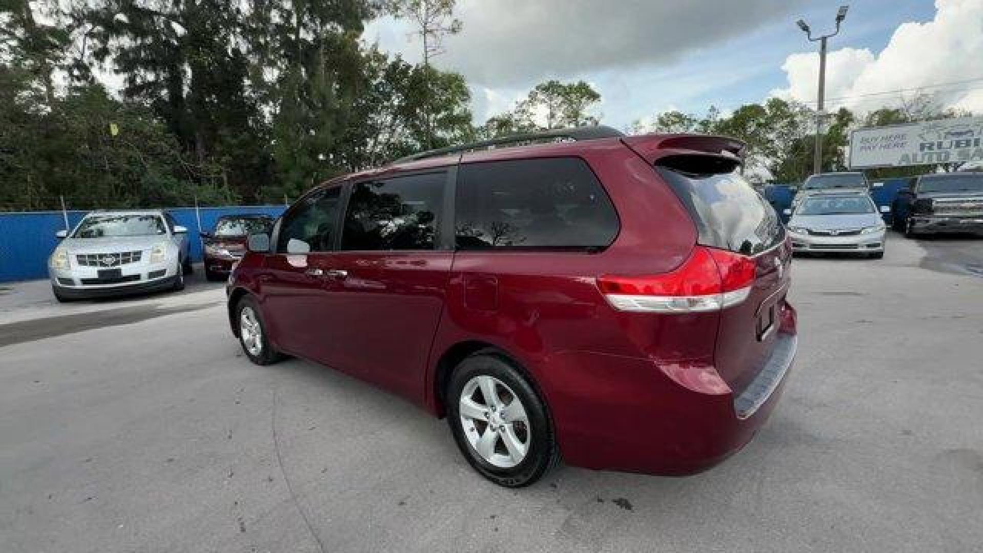 2011 Red Toyota Sienna Base (5TDKK3DC2BS) with an 6 3.5L engine, Automatic transmission, located at 27610 S Dixie Hwy, Homestead, FL, 33032, (305) 749-2348, 25.510241, -80.438301 - IIHS Top Safety Pick. Only 81,190 Miles! Scores 24 Highway MPG and 18 City MPG! This Toyota Sienna boasts a Gas V6 3.5L/211 engine powering this Automatic transmission. XM satellite radio (subscription required), Washer-linked variable intermittent wipers -inc: de-icer grid, Vehicle stability contro - Photo#2