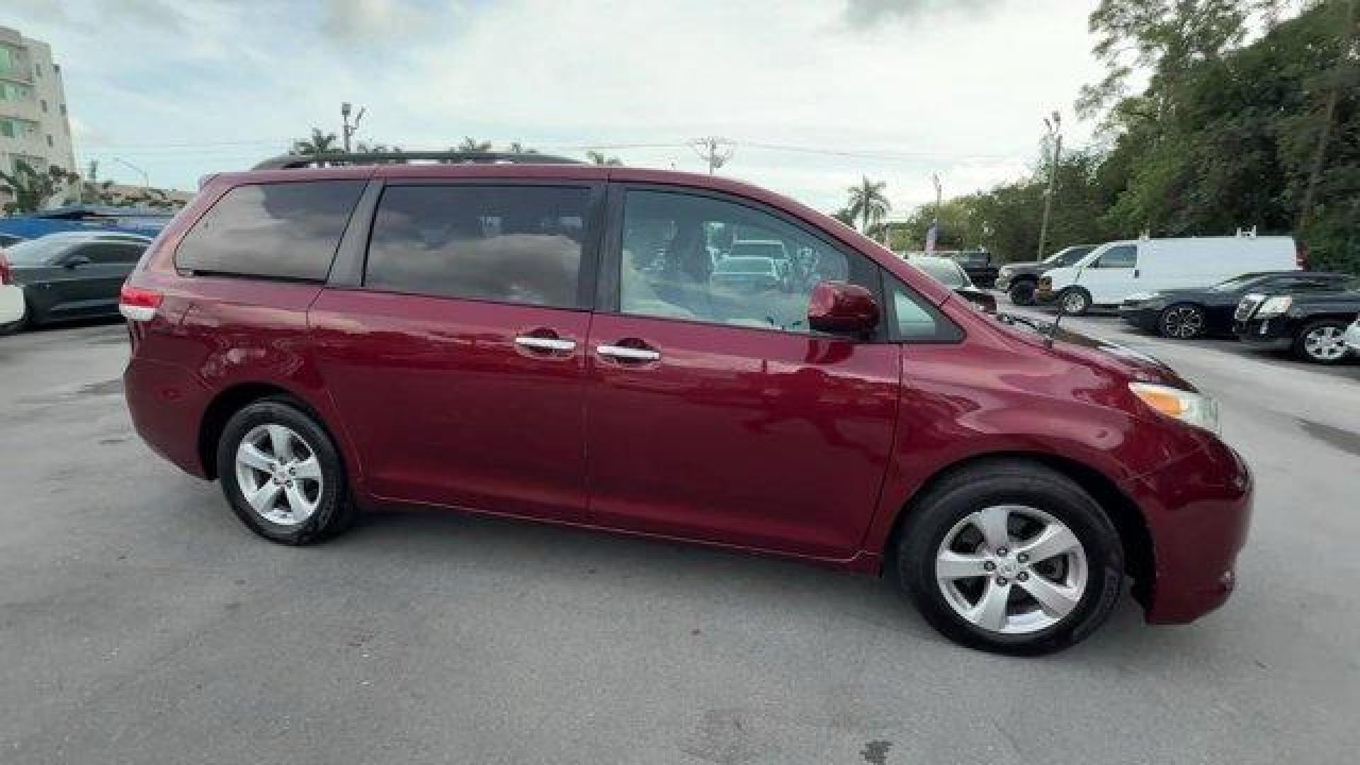 2011 Red Toyota Sienna Base (5TDKK3DC2BS) with an 6 3.5L engine, Automatic transmission, located at 27610 S Dixie Hwy, Homestead, FL, 33032, (305) 749-2348, 25.510241, -80.438301 - IIHS Top Safety Pick. Only 81,190 Miles! Scores 24 Highway MPG and 18 City MPG! This Toyota Sienna boasts a Gas V6 3.5L/211 engine powering this Automatic transmission. XM satellite radio (subscription required), Washer-linked variable intermittent wipers -inc: de-icer grid, Vehicle stability contro - Photo#5