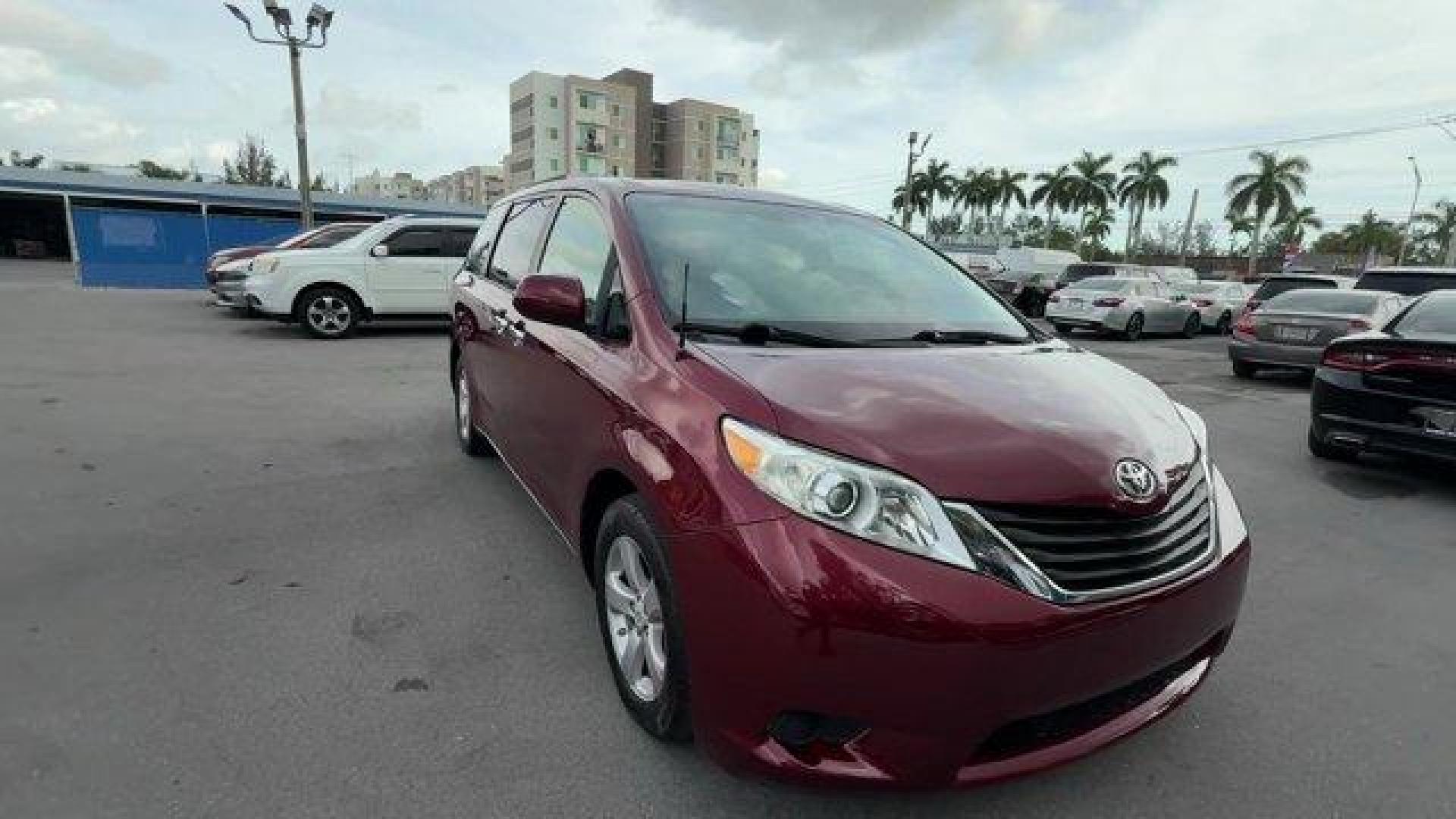 2011 Red Toyota Sienna Base (5TDKK3DC2BS) with an 6 3.5L engine, Automatic transmission, located at 27610 S Dixie Hwy, Homestead, FL, 33032, (305) 749-2348, 25.510241, -80.438301 - IIHS Top Safety Pick. Only 81,190 Miles! Scores 24 Highway MPG and 18 City MPG! This Toyota Sienna boasts a Gas V6 3.5L/211 engine powering this Automatic transmission. XM satellite radio (subscription required), Washer-linked variable intermittent wipers -inc: de-icer grid, Vehicle stability contro - Photo#6