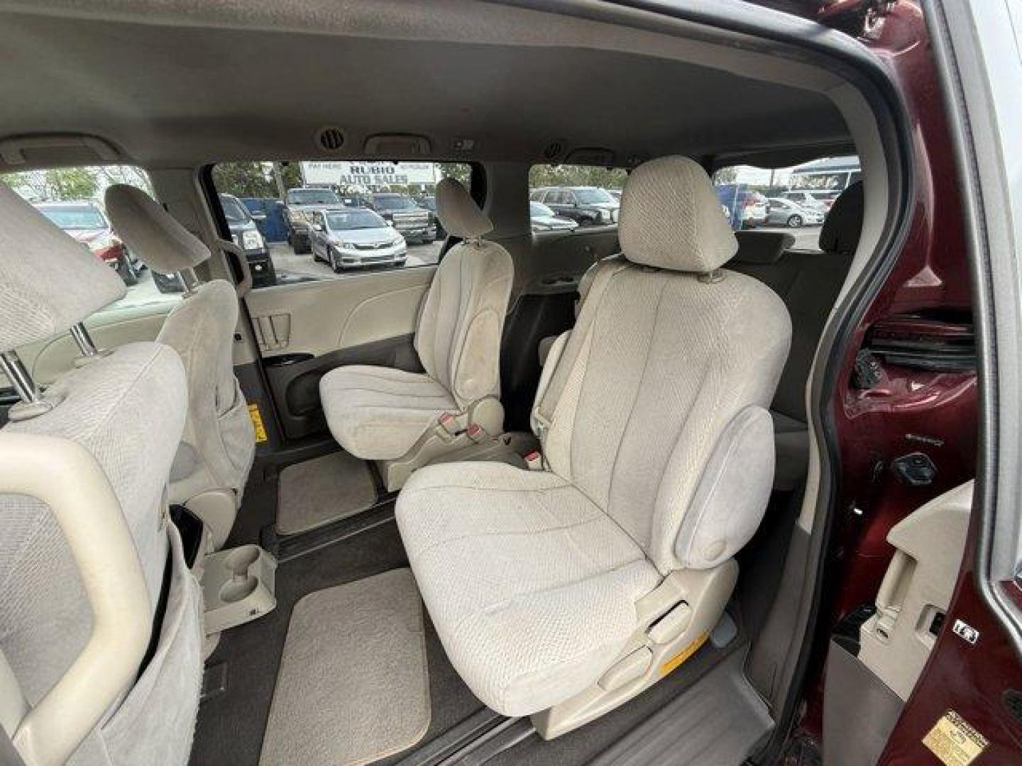 2011 Red Toyota Sienna Base (5TDKK3DC2BS) with an 6 3.5L engine, Automatic transmission, located at 27610 S Dixie Hwy, Homestead, FL, 33032, (305) 749-2348, 25.510241, -80.438301 - IIHS Top Safety Pick. Only 81,190 Miles! Scores 24 Highway MPG and 18 City MPG! This Toyota Sienna boasts a Gas V6 3.5L/211 engine powering this Automatic transmission. XM satellite radio (subscription required), Washer-linked variable intermittent wipers -inc: de-icer grid, Vehicle stability contro - Photo#12