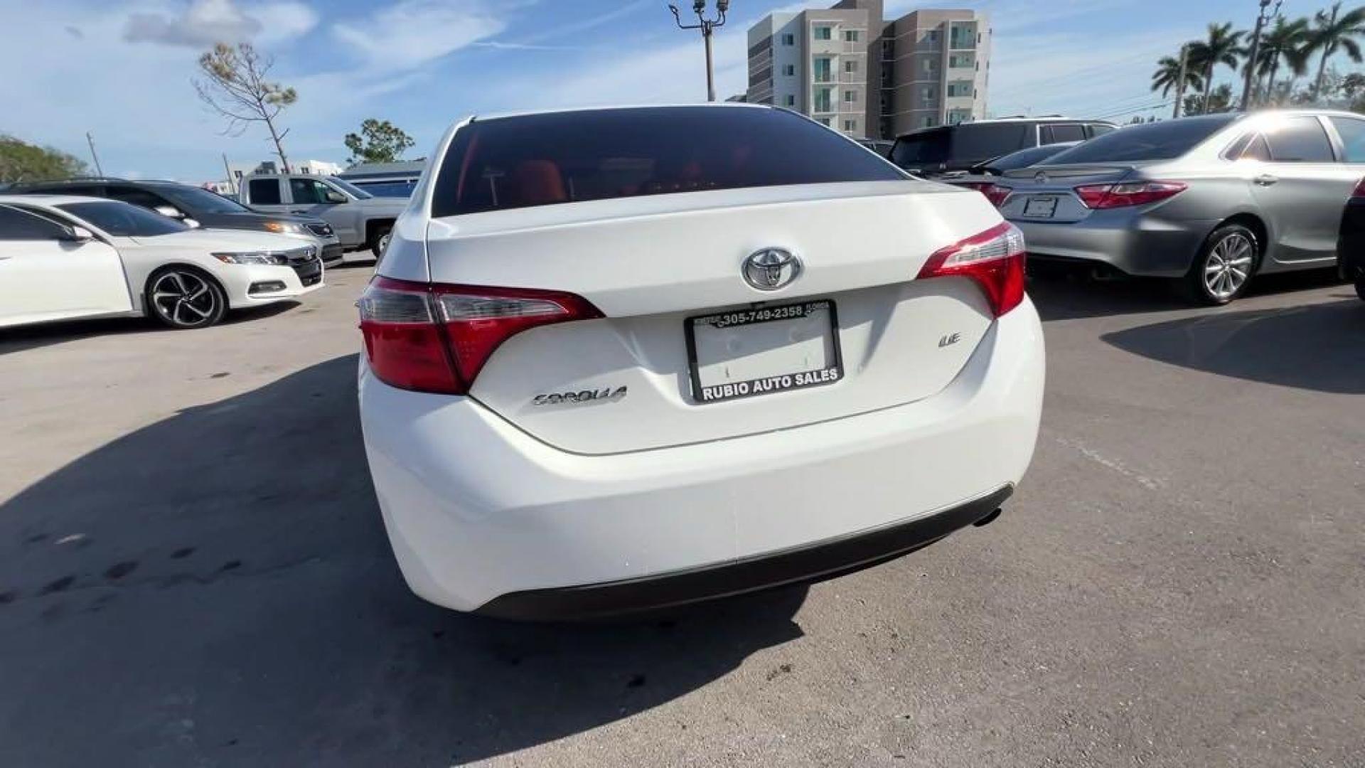 2014 Super White /Black Toyota Corolla L (5YFBURHE6EP) with an 1.8L I4 DOHC Dual VVT-i engine, Automatic transmission, located at 27610 S Dixie Hwy, Homestead, FL, 33032, (305) 749-2348, 25.510241, -80.438301 - Photo#3