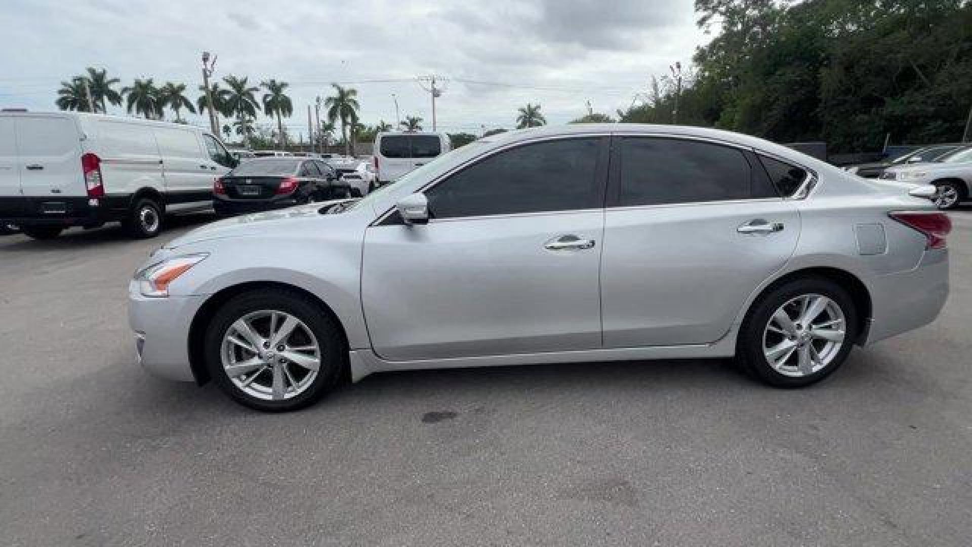 2014 Brilliant Silver Metallic /Charcoal Nissan Altima 2.5 SL (1N4AL3APXEC) with an 4 2.5 L engine, Variable transmission, located at 27610 S Dixie Hwy, Homestead, FL, 33032, (305) 749-2348, 25.510241, -80.438301 - IIHS Top Safety Pick. Scores 38 Highway MPG and 27 City MPG! This Nissan Altima boasts a Regular Unleaded I-4 2.5 L/152 engine powering this Variable transmission. CHARCOAL, LEATHER-APPOINTED SEAT TRIM, BRILLIANT SILVER METALLIC, [Z66] ACTIVATION DISCLAIMER.*This Nissan Altima Comes Equipped with Th - Photo#1