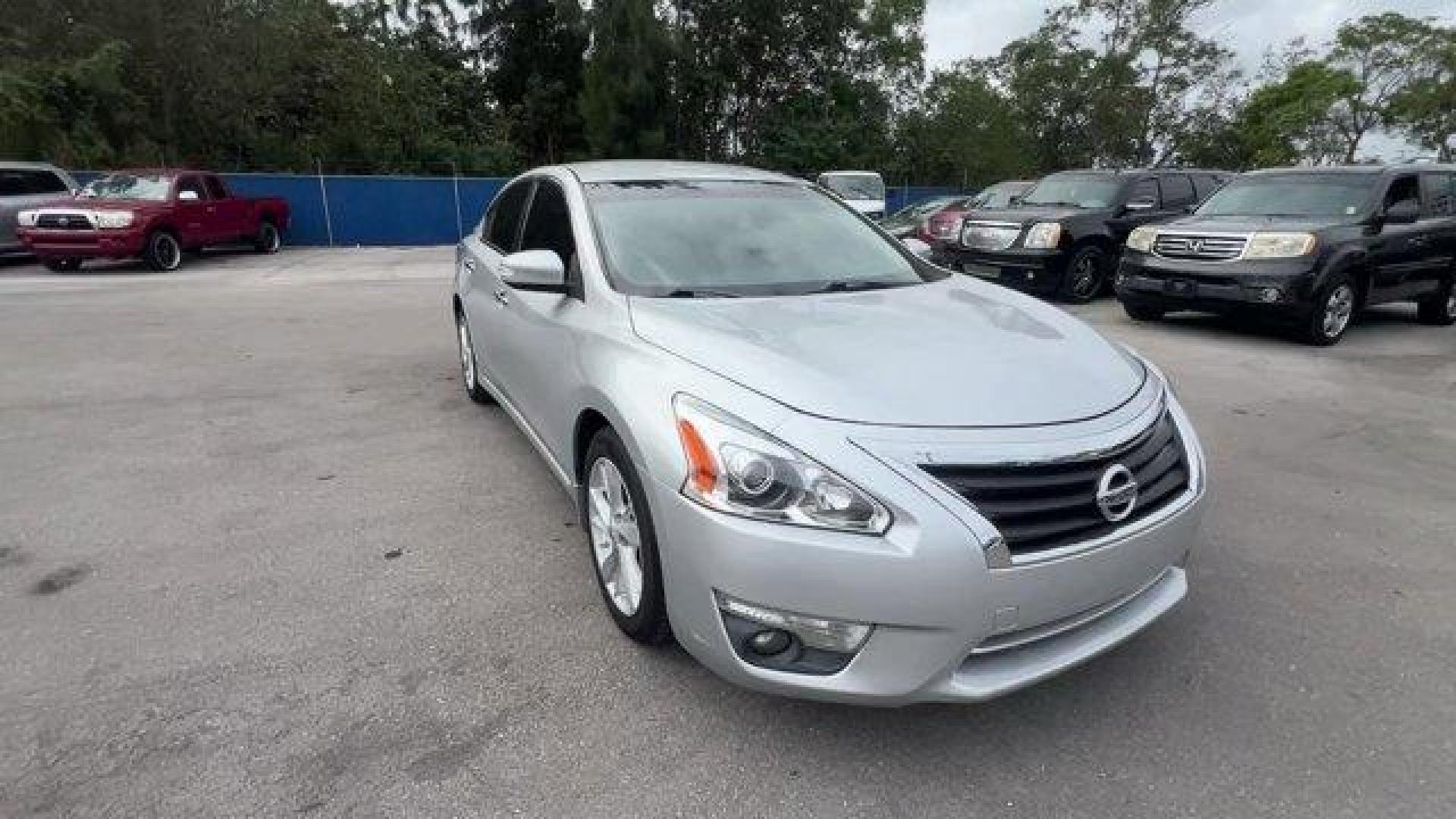 2014 Brilliant Silver Metallic /Charcoal Nissan Altima 2.5 SL (1N4AL3APXEC) with an 4 2.5 L engine, Variable transmission, located at 27610 S Dixie Hwy, Homestead, FL, 33032, (305) 749-2348, 25.510241, -80.438301 - IIHS Top Safety Pick. Scores 38 Highway MPG and 27 City MPG! This Nissan Altima boasts a Regular Unleaded I-4 2.5 L/152 engine powering this Variable transmission. CHARCOAL, LEATHER-APPOINTED SEAT TRIM, BRILLIANT SILVER METALLIC, [Z66] ACTIVATION DISCLAIMER.*This Nissan Altima Comes Equipped with Th - Photo#6