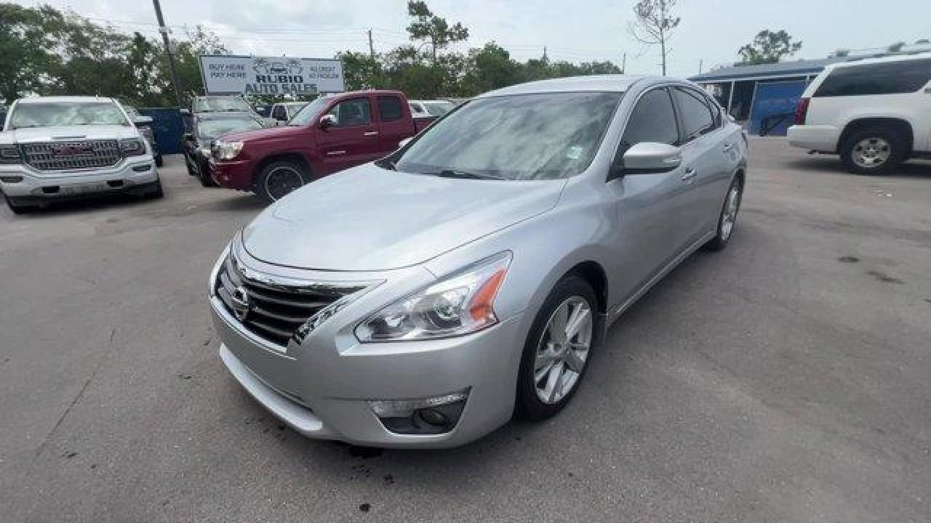 2014 Brilliant Silver Metallic /Charcoal Nissan Altima 2.5 SL (1N4AL3APXEC) with an 4 2.5 L engine, Variable transmission, located at 27610 S Dixie Hwy, Homestead, FL, 33032, (305) 749-2348, 25.510241, -80.438301 - IIHS Top Safety Pick. Scores 38 Highway MPG and 27 City MPG! This Nissan Altima boasts a Regular Unleaded I-4 2.5 L/152 engine powering this Variable transmission. CHARCOAL, LEATHER-APPOINTED SEAT TRIM, BRILLIANT SILVER METALLIC, [Z66] ACTIVATION DISCLAIMER.*This Nissan Altima Comes Equipped with Th - Photo#0