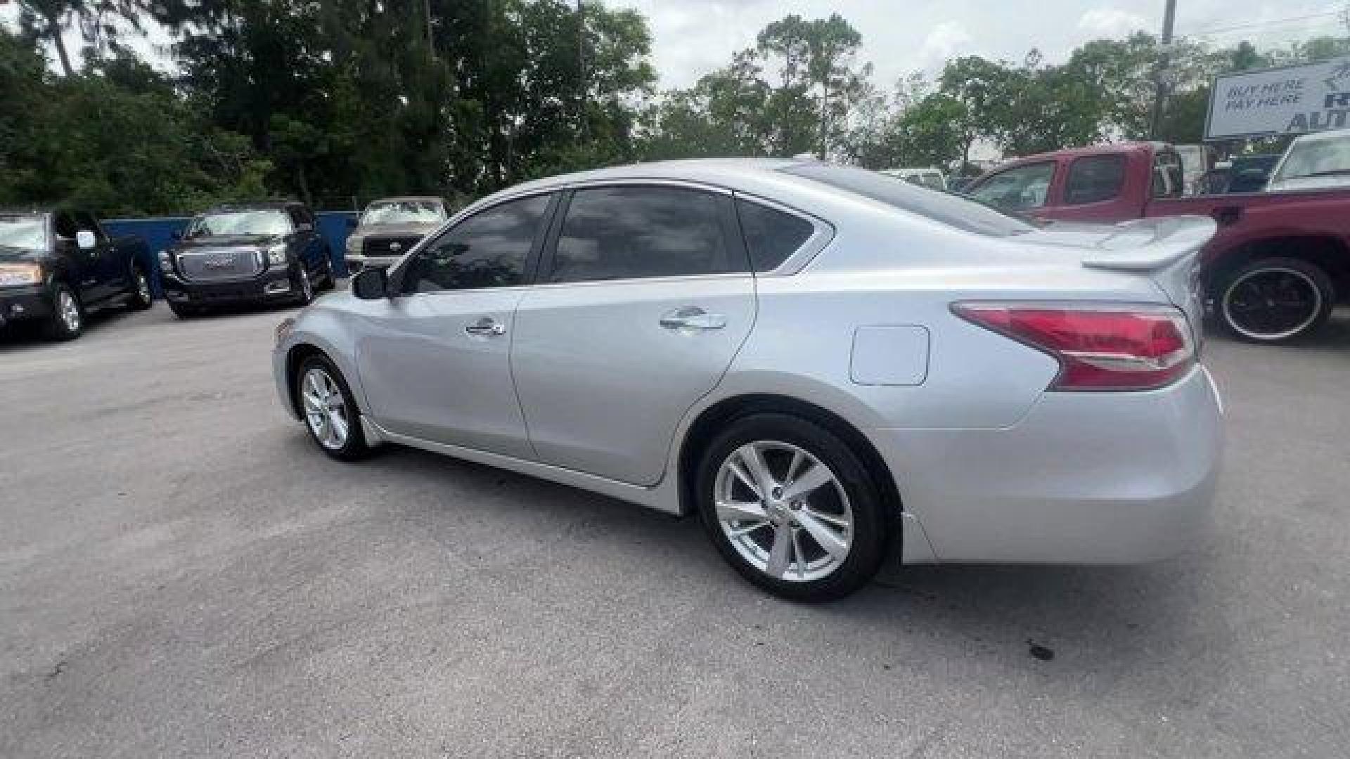 2014 Brilliant Silver Metallic /Charcoal Nissan Altima 2.5 SL (1N4AL3APXEC) with an 4 2.5 L engine, Variable transmission, located at 27610 S Dixie Hwy, Homestead, FL, 33032, (305) 749-2348, 25.510241, -80.438301 - IIHS Top Safety Pick. Scores 38 Highway MPG and 27 City MPG! This Nissan Altima boasts a Regular Unleaded I-4 2.5 L/152 engine powering this Variable transmission. CHARCOAL, LEATHER-APPOINTED SEAT TRIM, BRILLIANT SILVER METALLIC, [Z66] ACTIVATION DISCLAIMER.*This Nissan Altima Comes Equipped with Th - Photo#2