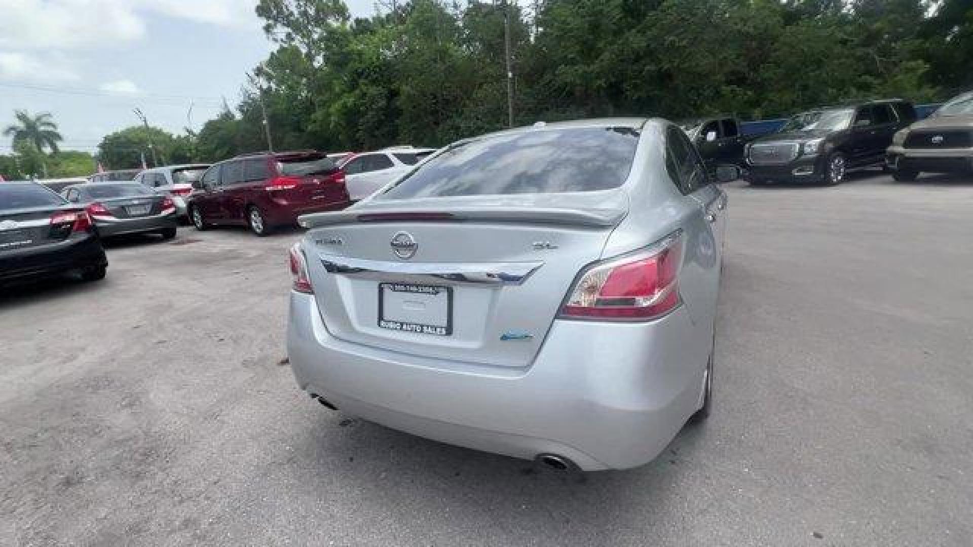 2014 Brilliant Silver Metallic /Charcoal Nissan Altima 2.5 SL (1N4AL3APXEC) with an 4 2.5 L engine, Variable transmission, located at 27610 S Dixie Hwy, Homestead, FL, 33032, (305) 749-2348, 25.510241, -80.438301 - IIHS Top Safety Pick. Scores 38 Highway MPG and 27 City MPG! This Nissan Altima boasts a Regular Unleaded I-4 2.5 L/152 engine powering this Variable transmission. CHARCOAL, LEATHER-APPOINTED SEAT TRIM, BRILLIANT SILVER METALLIC, [Z66] ACTIVATION DISCLAIMER.*This Nissan Altima Comes Equipped with Th - Photo#4