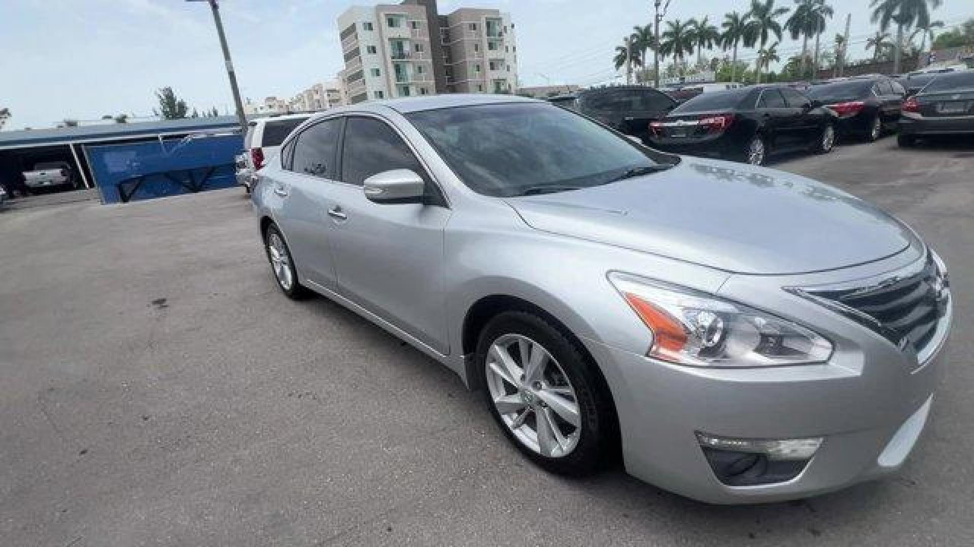 2014 Brilliant Silver Metallic /Charcoal Nissan Altima 2.5 SL (1N4AL3APXEC) with an 4 2.5 L engine, Variable transmission, located at 27610 S Dixie Hwy, Homestead, FL, 33032, (305) 749-2348, 25.510241, -80.438301 - IIHS Top Safety Pick. Scores 38 Highway MPG and 27 City MPG! This Nissan Altima boasts a Regular Unleaded I-4 2.5 L/152 engine powering this Variable transmission. CHARCOAL, LEATHER-APPOINTED SEAT TRIM, BRILLIANT SILVER METALLIC, [Z66] ACTIVATION DISCLAIMER.*This Nissan Altima Comes Equipped with Th - Photo#6
