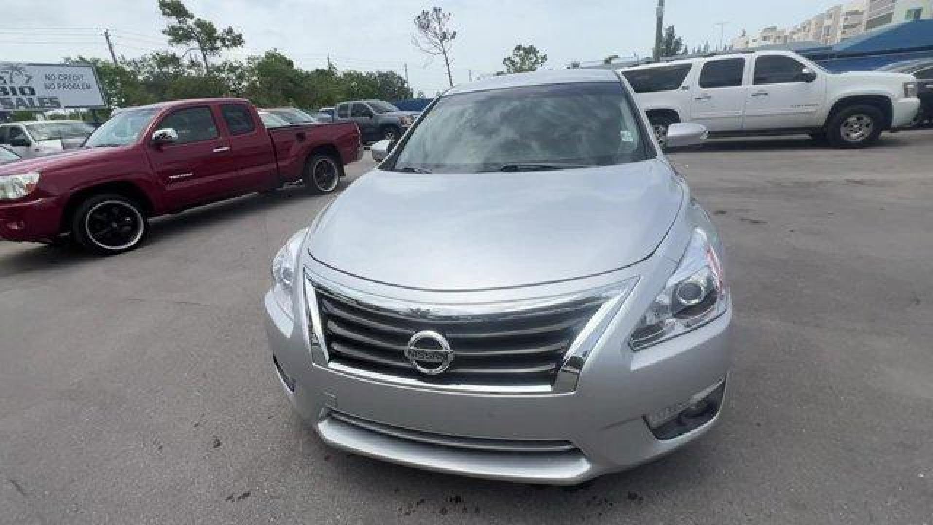 2014 Brilliant Silver Metallic /Charcoal Nissan Altima 2.5 SL (1N4AL3APXEC) with an 4 2.5 L engine, Variable transmission, located at 27610 S Dixie Hwy, Homestead, FL, 33032, (305) 749-2348, 25.510241, -80.438301 - IIHS Top Safety Pick. Scores 38 Highway MPG and 27 City MPG! This Nissan Altima boasts a Regular Unleaded I-4 2.5 L/152 engine powering this Variable transmission. CHARCOAL, LEATHER-APPOINTED SEAT TRIM, BRILLIANT SILVER METALLIC, [Z66] ACTIVATION DISCLAIMER.*This Nissan Altima Comes Equipped with Th - Photo#7