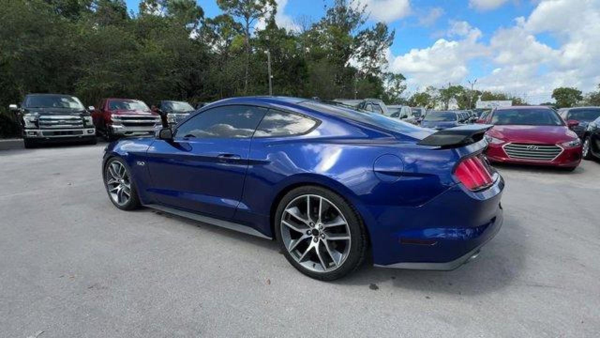 2015 Blue Ford Mustang GT Premium (1FA6P8CFXF5) with an 8 5.0 L engine, Automatic transmission, located at 27610 S Dixie Hwy, Homestead, FL, 33032, (305) 749-2348, 25.510241, -80.438301 - KBB.com Best Buy Awards Finalist. Only 92,923 Miles! Scores 25 Highway MPG and 15 City MPG! This Ford Mustang boasts a Premium Unleaded V-8 5.0 L/302 engine powering this Automatic transmission. Wheels: 18 x 8 Magnetic Painted/Machined -inc: Aluminum, Trunk Rear Cargo Access, Trip Computer.*This For - Photo#2