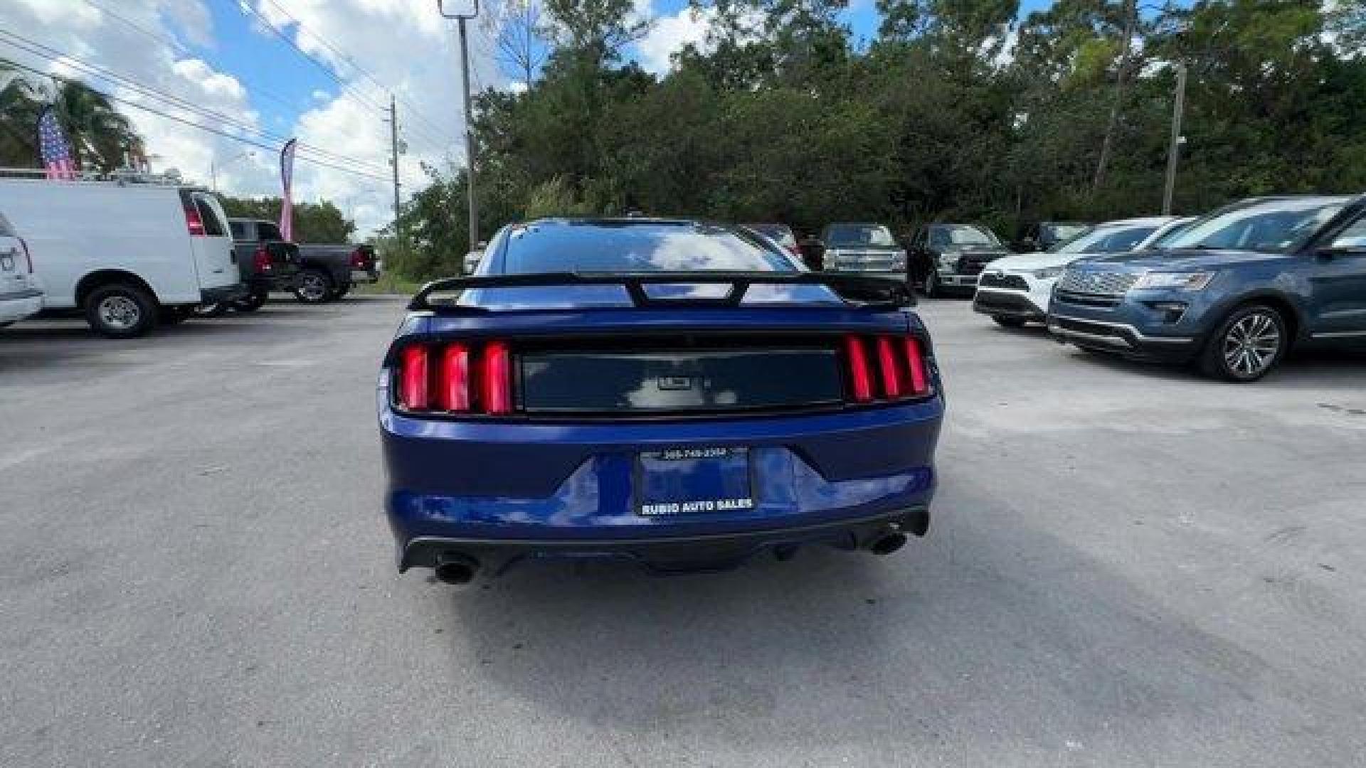 2015 Blue Ford Mustang GT Premium (1FA6P8CFXF5) with an 8 5.0 L engine, Automatic transmission, located at 27610 S Dixie Hwy, Homestead, FL, 33032, (305) 749-2348, 25.510241, -80.438301 - KBB.com Best Buy Awards Finalist. Only 92,923 Miles! Scores 25 Highway MPG and 15 City MPG! This Ford Mustang boasts a Premium Unleaded V-8 5.0 L/302 engine powering this Automatic transmission. Wheels: 18 x 8 Magnetic Painted/Machined -inc: Aluminum, Trunk Rear Cargo Access, Trip Computer.*This For - Photo#3