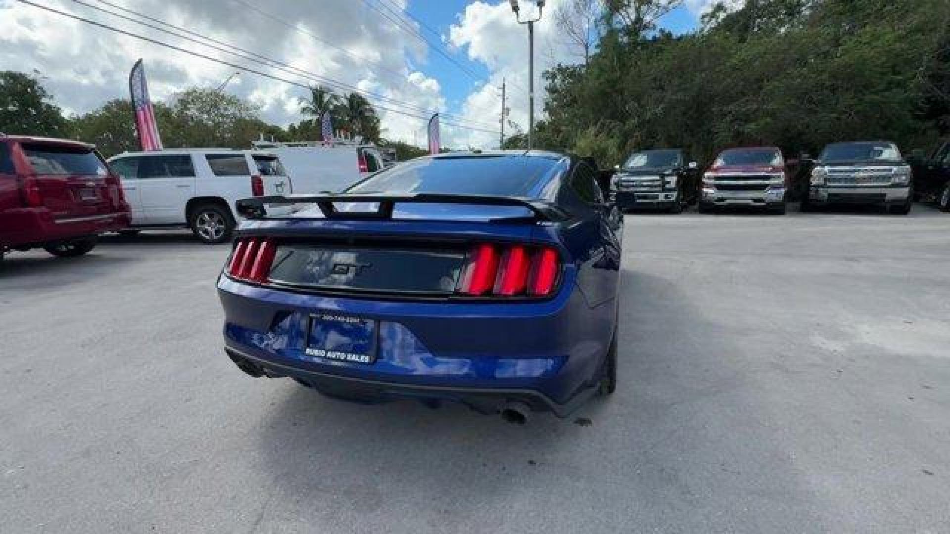 2015 Blue Ford Mustang GT Premium (1FA6P8CFXF5) with an 8 5.0 L engine, Automatic transmission, located at 27610 S Dixie Hwy, Homestead, FL, 33032, (305) 749-2348, 25.510241, -80.438301 - KBB.com Best Buy Awards Finalist. Only 92,923 Miles! Scores 25 Highway MPG and 15 City MPG! This Ford Mustang boasts a Premium Unleaded V-8 5.0 L/302 engine powering this Automatic transmission. Wheels: 18 x 8 Magnetic Painted/Machined -inc: Aluminum, Trunk Rear Cargo Access, Trip Computer.*This For - Photo#4