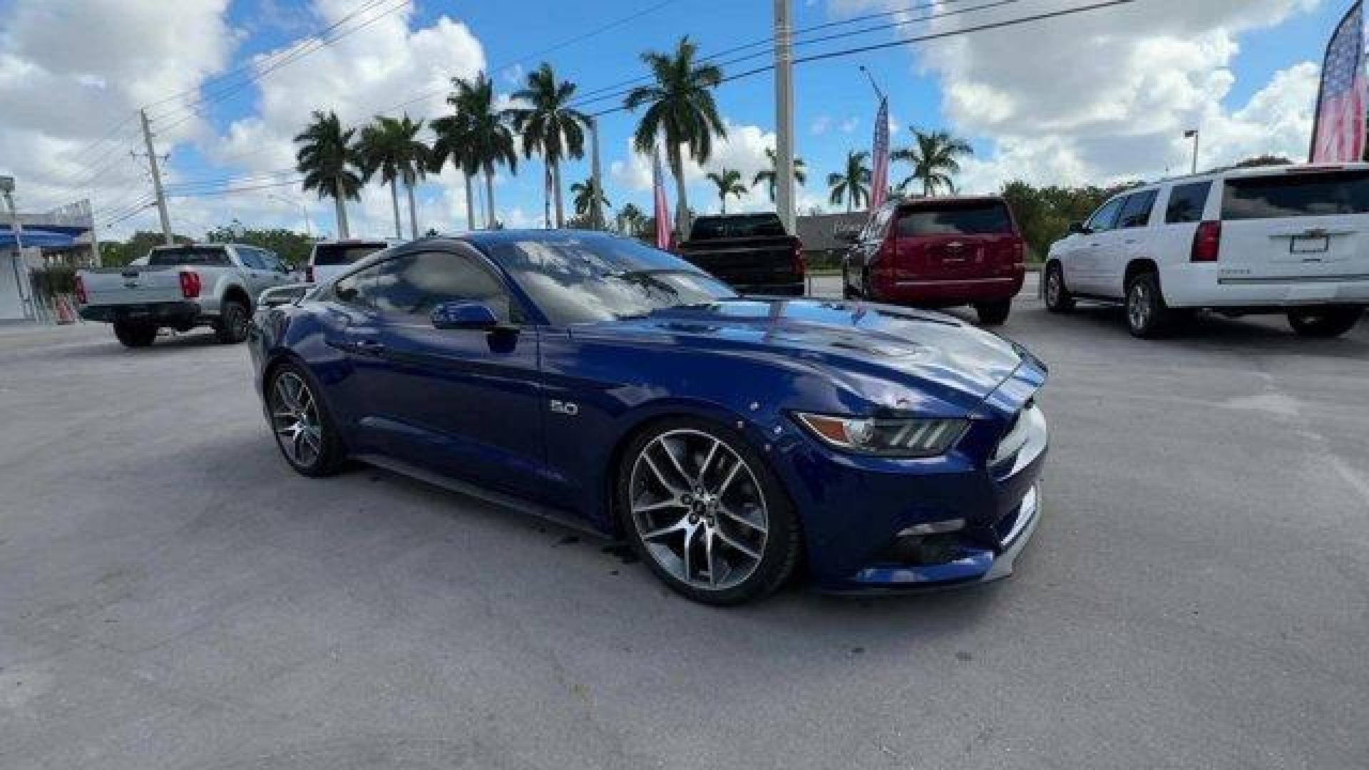 2015 Blue Ford Mustang GT Premium (1FA6P8CFXF5) with an 8 5.0 L engine, Automatic transmission, located at 27610 S Dixie Hwy, Homestead, FL, 33032, (305) 749-2348, 25.510241, -80.438301 - KBB.com Best Buy Awards Finalist. Only 92,923 Miles! Scores 25 Highway MPG and 15 City MPG! This Ford Mustang boasts a Premium Unleaded V-8 5.0 L/302 engine powering this Automatic transmission. Wheels: 18 x 8 Magnetic Painted/Machined -inc: Aluminum, Trunk Rear Cargo Access, Trip Computer.*This For - Photo#6