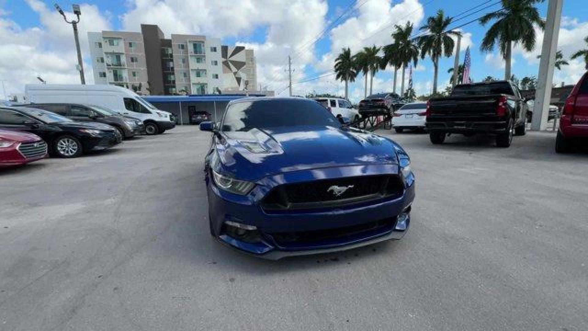 2015 Blue Ford Mustang GT Premium (1FA6P8CFXF5) with an 8 5.0 L engine, Automatic transmission, located at 27610 S Dixie Hwy, Homestead, FL, 33032, (305) 749-2348, 25.510241, -80.438301 - KBB.com Best Buy Awards Finalist. Only 92,923 Miles! Scores 25 Highway MPG and 15 City MPG! This Ford Mustang boasts a Premium Unleaded V-8 5.0 L/302 engine powering this Automatic transmission. Wheels: 18 x 8 Magnetic Painted/Machined -inc: Aluminum, Trunk Rear Cargo Access, Trip Computer.*This For - Photo#7