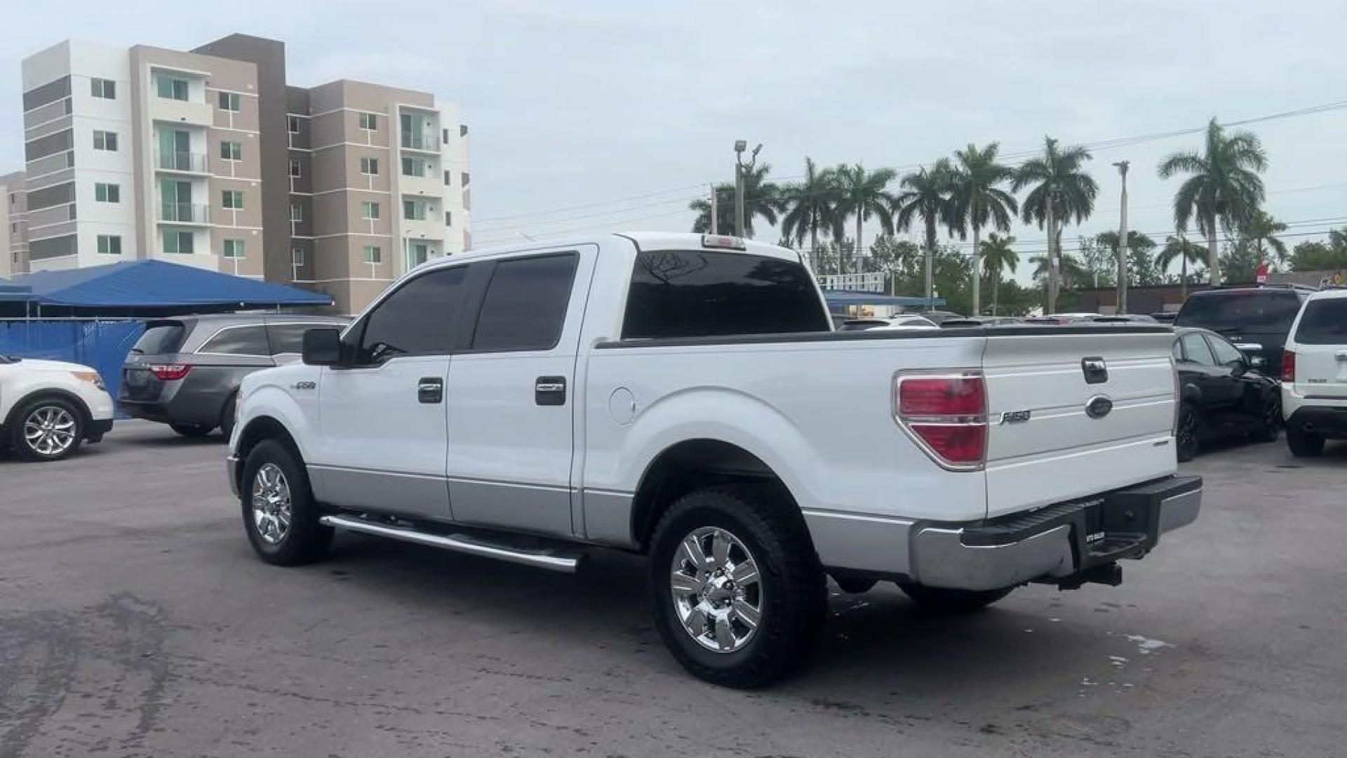 2011 White /Steel Gray Ford F-150 XLT (1FTFW1CF8BF) with an 5.0L V8 FFV engine, Automatic transmission, located at 27610 S Dixie Hwy, Homestead, FL, 33032, (305) 749-2348, 25.510241, -80.438301 - Photo#2
