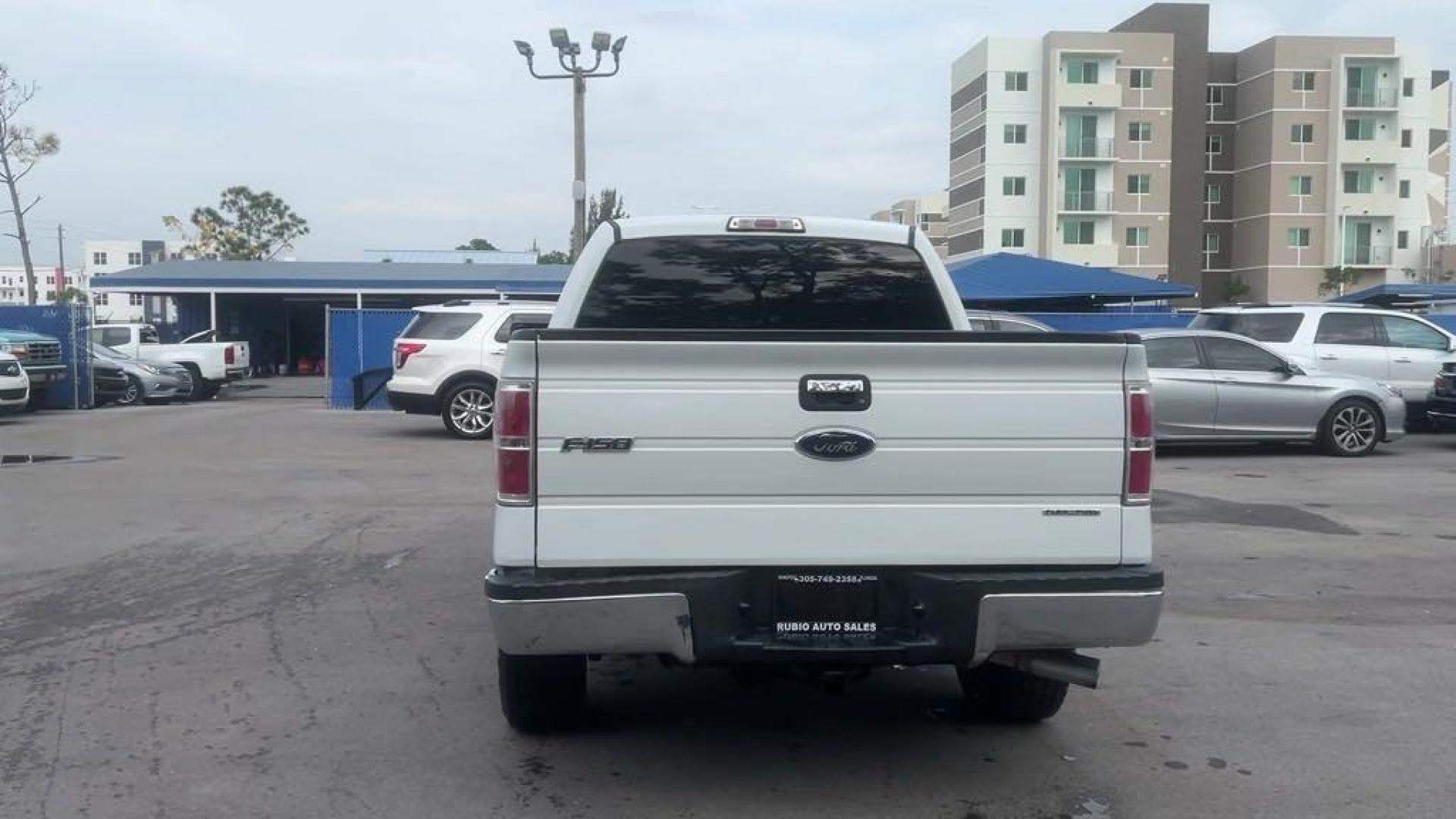 2011 White /Steel Gray Ford F-150 XLT (1FTFW1CF8BF) with an 5.0L V8 FFV engine, Automatic transmission, located at 27610 S Dixie Hwy, Homestead, FL, 33032, (305) 749-2348, 25.510241, -80.438301 - Photo#3