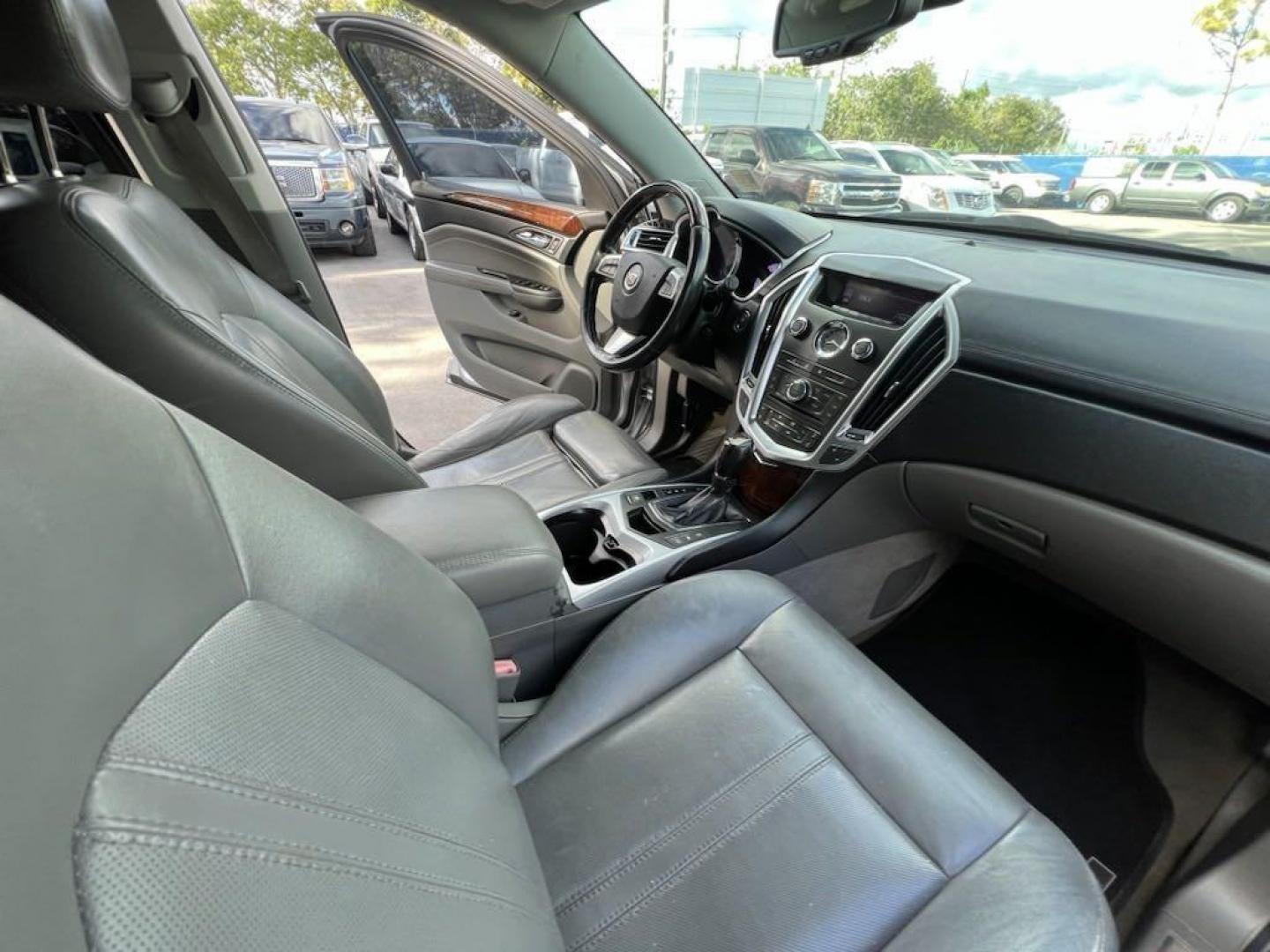 2012 Radiant Silver Metallic /Titanium W/Ebony Accents Cadillac SRX Luxury (3GYFNDE32CS) with an 3.6L V6 SIDI DOHC VVT engine, Automatic transmission, located at 27610 S Dixie Hwy, Homestead, FL, 33032, (305) 749-2348, 25.510241, -80.438301 - Photo#15