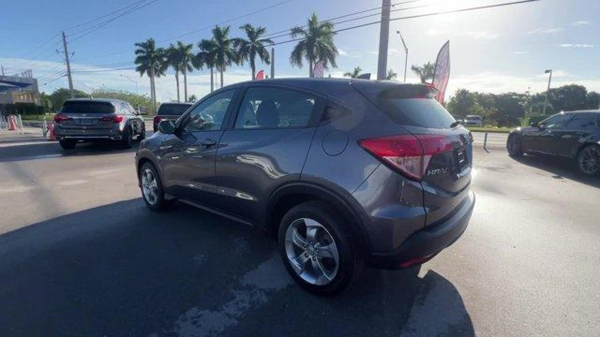 2018 Gray Honda HR-V LX 2WD CVT (3CZRU5H39JG) with an 4 1.8 L engine, Variable transmission, located at 27610 S Dixie Hwy, Homestead, FL, 33032, (305) 749-2348, 25.510241, -80.438301 - KBB.com 10 Most Awarded Brands. Only 70,359 Miles! Boasts 34 Highway MPG and 28 City MPG! This Honda HR-V delivers a Regular Unleaded I-4 1.8 L/110 engine powering this Variable transmission. Wheels: 17 Machine-Finished Alloy w/Silver Insert, VSA Electronic Stability Control (ESC), Urethane Gear Shi - Photo#2