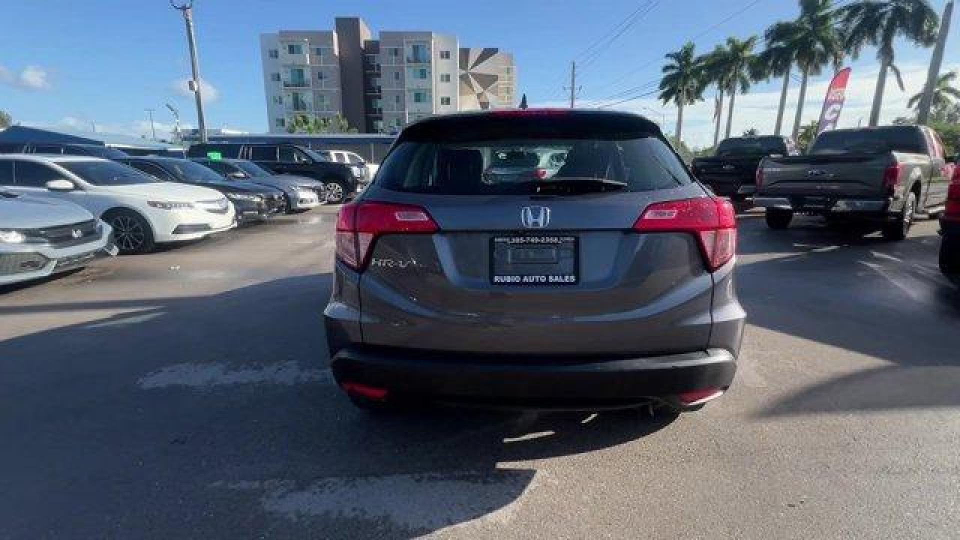 2018 Gray Honda HR-V LX 2WD CVT (3CZRU5H39JG) with an 4 1.8 L engine, Variable transmission, located at 27610 S Dixie Hwy, Homestead, FL, 33032, (305) 749-2348, 25.510241, -80.438301 - KBB.com 10 Most Awarded Brands. Only 70,359 Miles! Boasts 34 Highway MPG and 28 City MPG! This Honda HR-V delivers a Regular Unleaded I-4 1.8 L/110 engine powering this Variable transmission. Wheels: 17 Machine-Finished Alloy w/Silver Insert, VSA Electronic Stability Control (ESC), Urethane Gear Shi - Photo#3