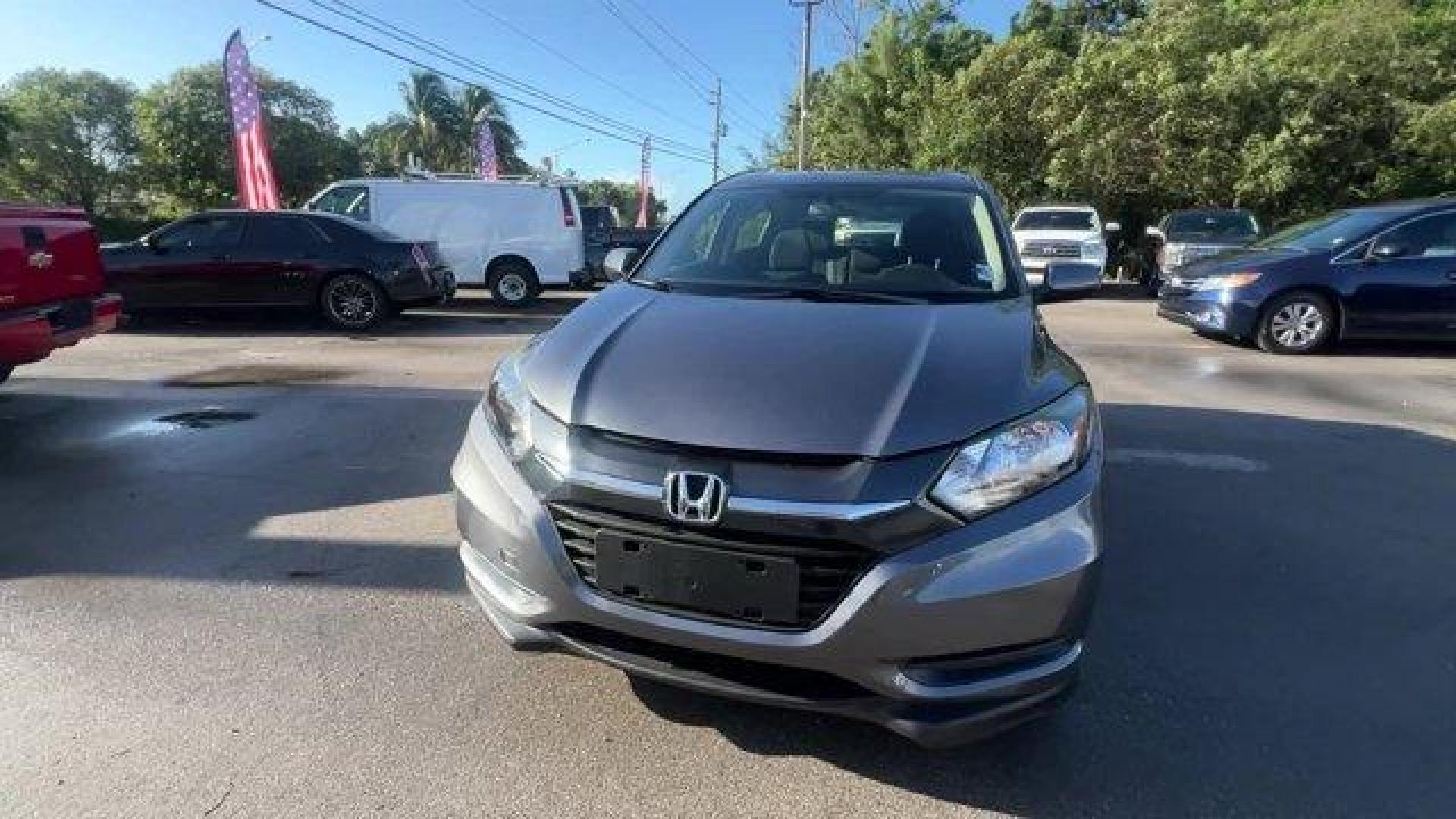 2018 Gray Honda HR-V LX 2WD CVT (3CZRU5H39JG) with an 4 1.8 L engine, Variable transmission, located at 27610 S Dixie Hwy, Homestead, FL, 33032, (305) 749-2348, 25.510241, -80.438301 - KBB.com 10 Most Awarded Brands. Only 70,359 Miles! Boasts 34 Highway MPG and 28 City MPG! This Honda HR-V delivers a Regular Unleaded I-4 1.8 L/110 engine powering this Variable transmission. Wheels: 17 Machine-Finished Alloy w/Silver Insert, VSA Electronic Stability Control (ESC), Urethane Gear Shi - Photo#7