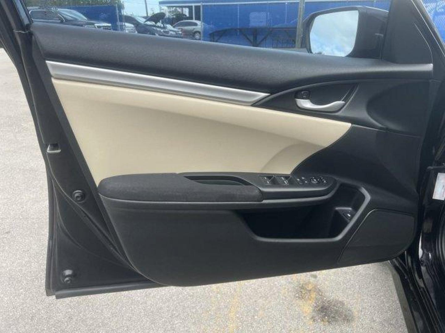 2017 Black Honda Civic Sedan LX (19XFC2F56HE) with an 4 2.0 L engine, Variable transmission, located at 27610 S Dixie Hwy, Homestead, FL, 33032, (305) 749-2348, 25.510241, -80.438301 - IIHS Top Safety Pick. Delivers 40 Highway MPG and 31 City MPG! This Honda Civic Sedan delivers a Regular Unleaded I-4 2.0 L/122 engine powering this Variable transmission. Wheels: 16 w/Full Covers, VSA Electronic Stability Control (ESC), Valet Function.*This Honda Civic Sedan Comes Equipped with The - Photo#8