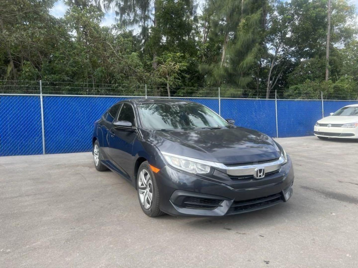 2016 Blue /Black/Gray Honda Civic LX (19XFC2F56GE) with an 2.0L I4 DOHC 16V i-VTEC engine, CVT transmission, located at 27610 S Dixie Hwy, Homestead, FL, 33032, (305) 749-2348, 25.510241, -80.438301 - Photo#0