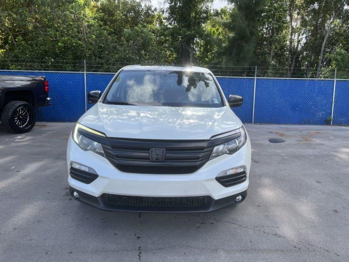 2016 White Diamond Pearl /Beige Honda Pilot EX-L (5FNYF5H57GB) with an 3.5L V6 24V SOHC i-VTEC engine, Automatic transmission, located at 27610 S Dixie Hwy, Homestead, FL, 33032, (305) 749-2348, 25.510241, -80.438301 - Photo#2