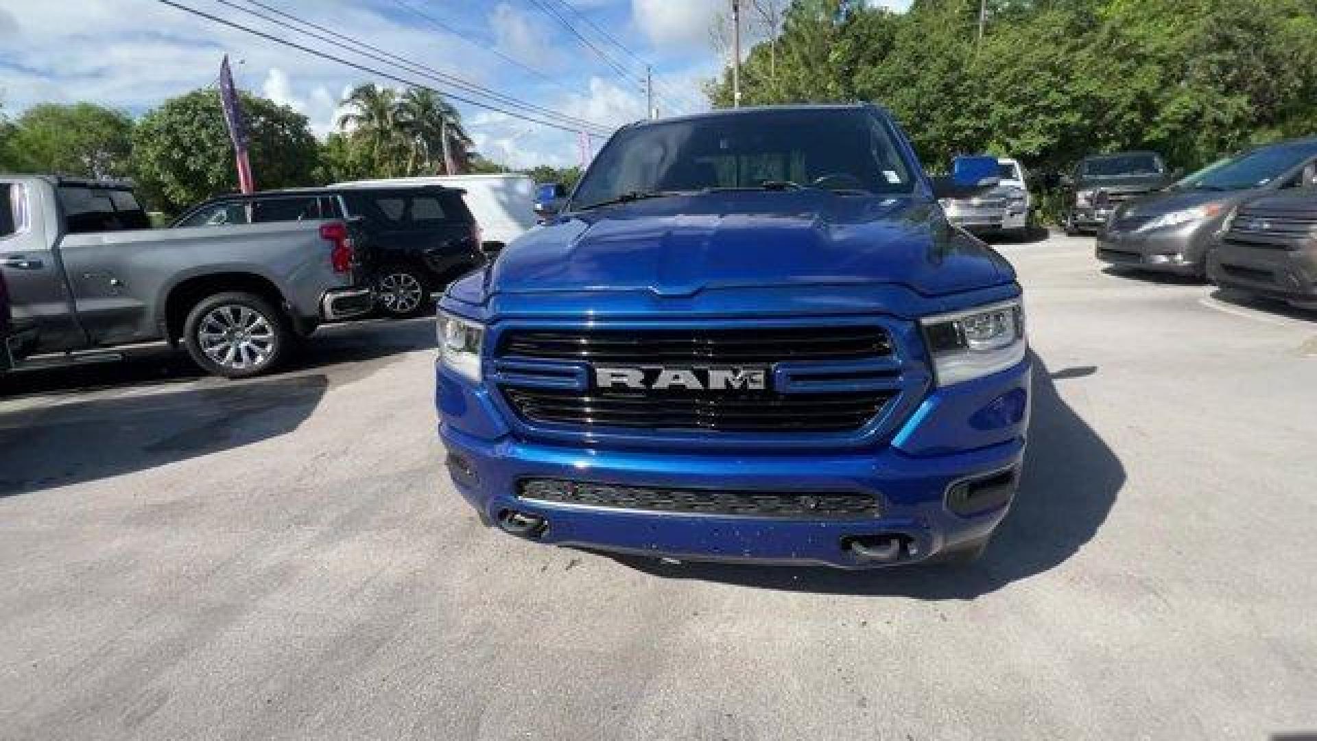 2019 Blue Streak Pearlcoat /Black Ram 1500 Big Horn/Lone Star (1C6SRFFT4KN) with an 8 5.7 L engine, Automatic transmission, located at 27610 S Dixie Hwy, Homestead, FL, 33032, (305) 749-2348, 25.510241, -80.438301 - KBB.com 10 Favorite New-for-2019 Cars. Only 42,855 Miles! Scores 22 Highway MPG and 17 City MPG! This Ram 1500 boasts a Regular Unleaded V-8 5.7 L/345 engine powering this Automatic transmission. WHEELS: 20 X 9 ALUMINUM CHROME CLAD, WHEEL TO WHEEL SIDE STEPS, TRANSMISSION: 8-SPEED AUTOMATIC (8HP75). - Photo#7