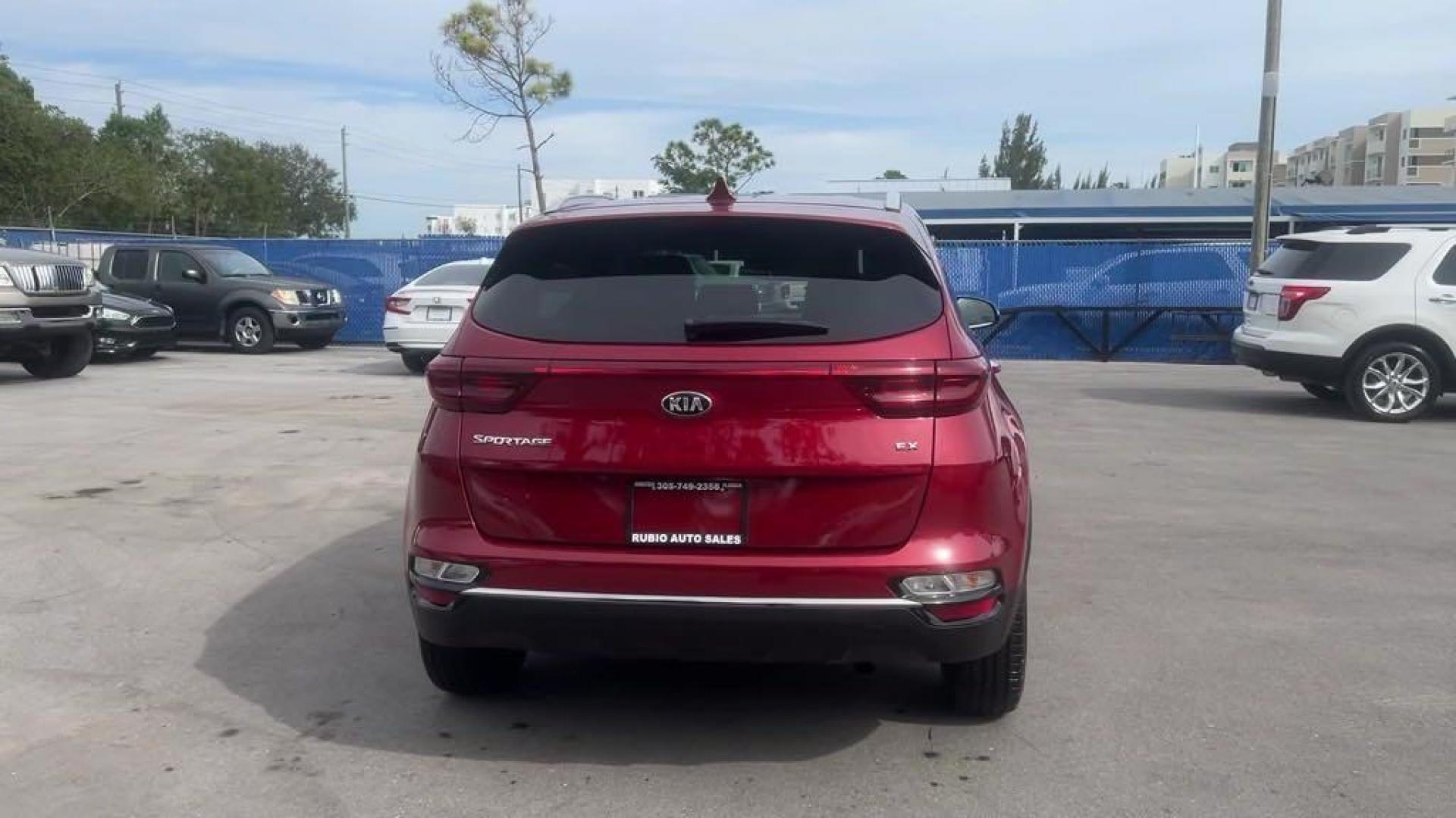 2020 Hyper Red /Black Kia Sportage EX (KNDPN3AC6L7) with an 2.4L I4 DGI DOHC 16V engine, Automatic transmission, located at 27610 S Dixie Hwy, Homestead, FL, 33032, (305) 749-2348, 25.510241, -80.438301 - Photo#3