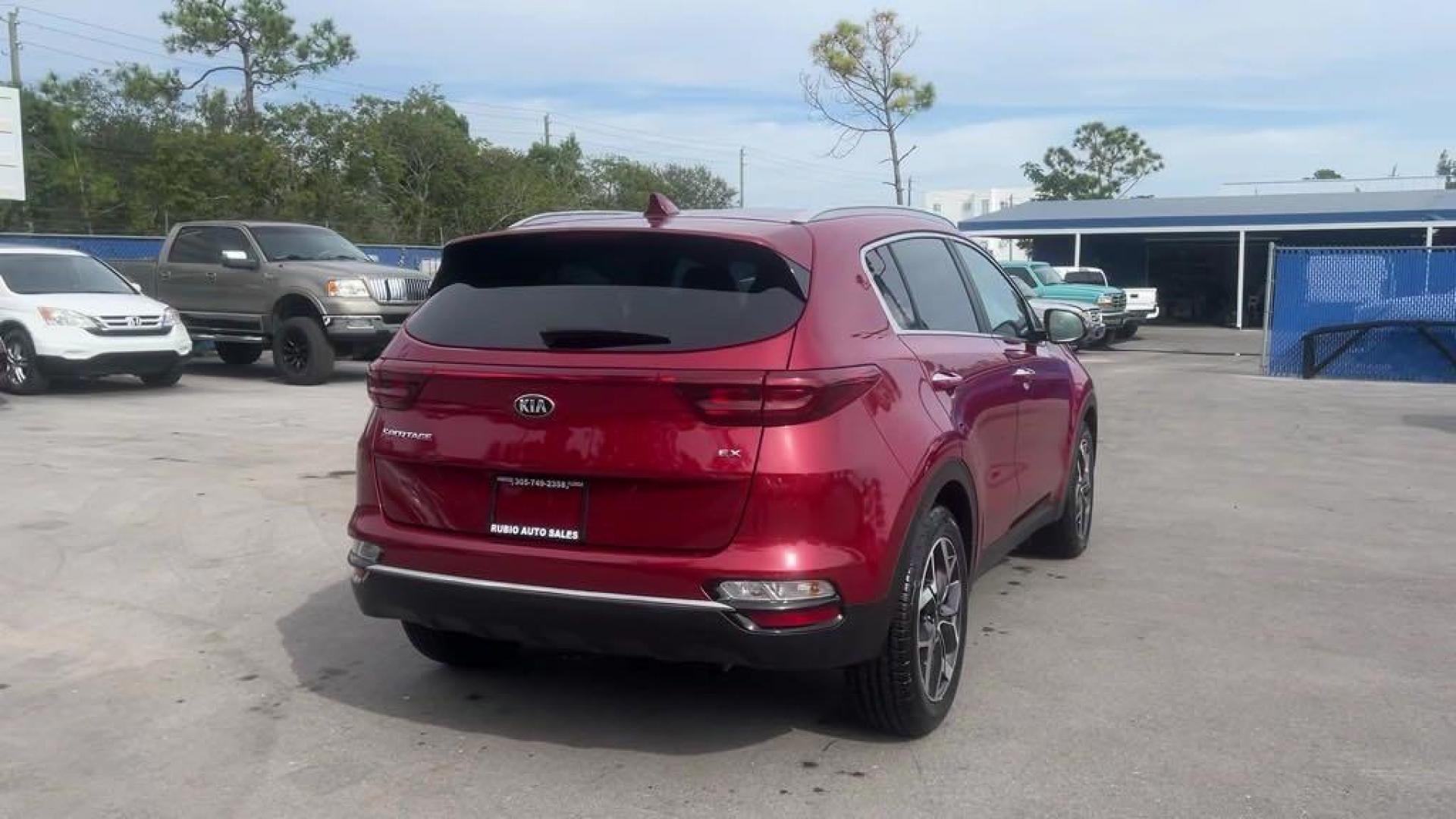 2020 Hyper Red /Black Kia Sportage EX (KNDPN3AC6L7) with an 2.4L I4 DGI DOHC 16V engine, Automatic transmission, located at 27610 S Dixie Hwy, Homestead, FL, 33032, (305) 749-2348, 25.510241, -80.438301 - Photo#4