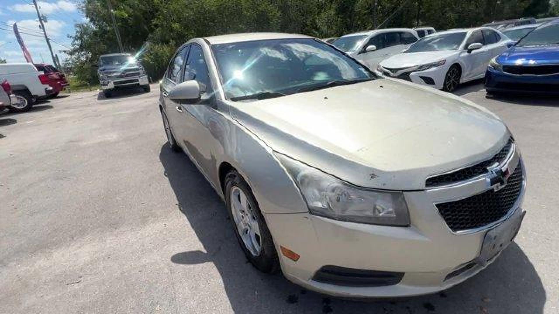 2014 Champagne Silver Metallic /Jet Black Chevrolet Cruze 1LT (1G1PD5SBXE7) with an 4 1.4L engine, Manual transmission, located at 27610 S Dixie Hwy, Homestead, FL, 33032, (305) 749-2348, 25.510241, -80.438301 - KBB.com 10 Best Sedans Under $25,000. Delivers 38 Highway MPG and 26 City MPG! This Chevrolet Cruze boasts a Turbocharged Gas I4 1.4L/83 engine powering this Manual transmission. TRANSMISSION, 6-SPEED MANUAL WITH OVERDRIVE, TECHNOLOGY PACKAGE includes (UFU) Chevrolet MyLink radio, (UP9) Chevrolet My - Photo#6
