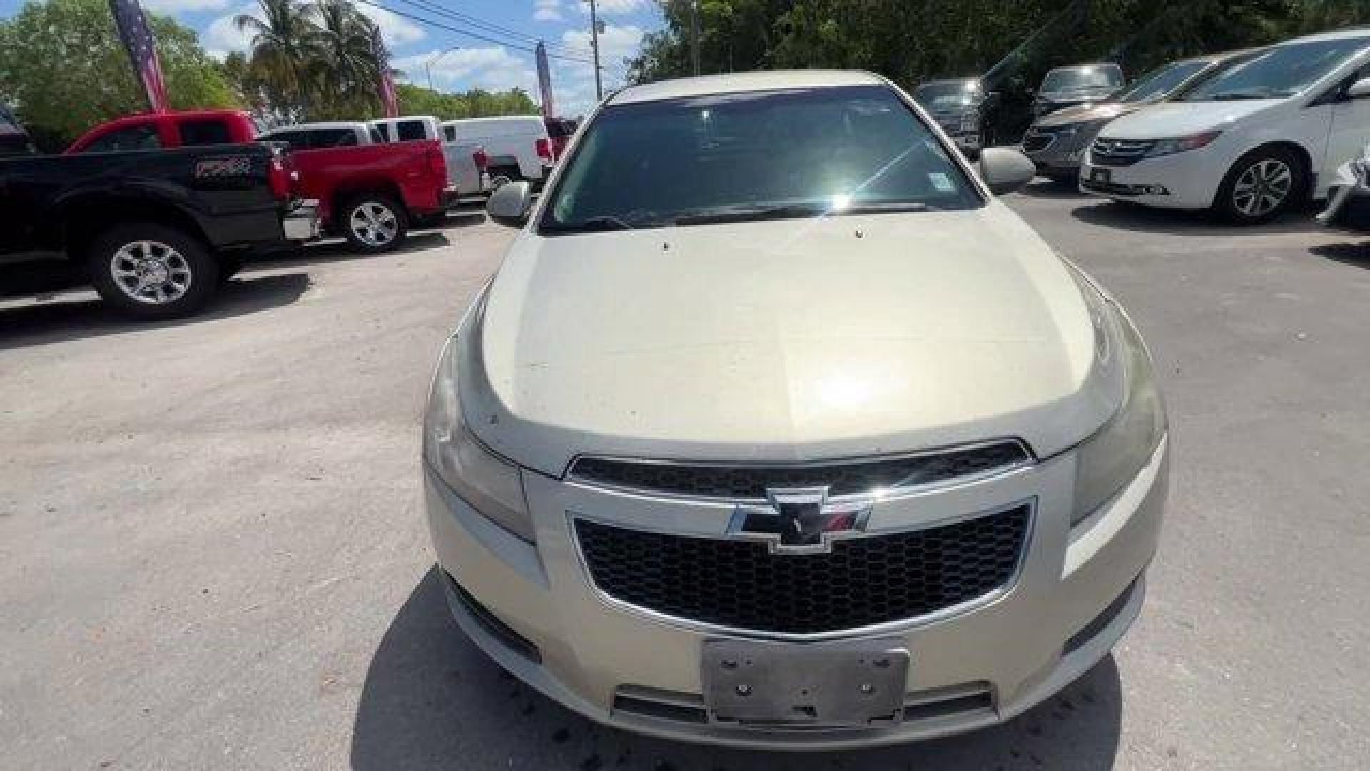 2014 Champagne Silver Metallic /Jet Black Chevrolet Cruze 1LT (1G1PD5SBXE7) with an 4 1.4L engine, Manual transmission, located at 27610 S Dixie Hwy, Homestead, FL, 33032, (305) 749-2348, 25.510241, -80.438301 - KBB.com 10 Best Sedans Under $25,000. Delivers 38 Highway MPG and 26 City MPG! This Chevrolet Cruze boasts a Turbocharged Gas I4 1.4L/83 engine powering this Manual transmission. TRANSMISSION, 6-SPEED MANUAL WITH OVERDRIVE, TECHNOLOGY PACKAGE includes (UFU) Chevrolet MyLink radio, (UP9) Chevrolet My - Photo#7