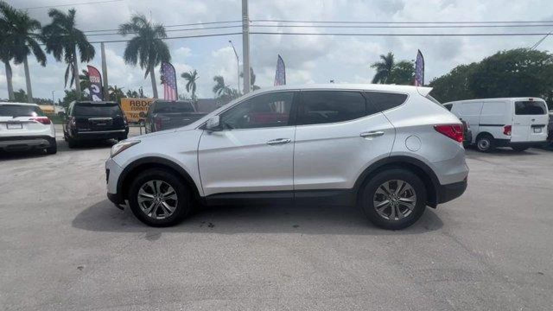 2014 Moonstone Silver /Gray Hyundai Santa Fe Sport Sport 2.4 FWD (5XYZT3LB0EG) with an 4 2.4 L engine, Automatic transmission, located at 27610 S Dixie Hwy, Homestead, FL, 33032, (305) 749-2348, 25.510241, -80.438301 - Boasts 27 Highway MPG and 20 City MPG! This Hyundai Santa Fe Sport delivers a Regular Unleaded I-4 2.4 L/144 engine powering this Automatic transmission. WHEEL LOCKS, REMOTE ENGINE START, OPTION GROUP 01 -inc: standard equipment.*This Hyundai Santa Fe Sport Comes Equipped with These Options *MUDGUAR - Photo#1