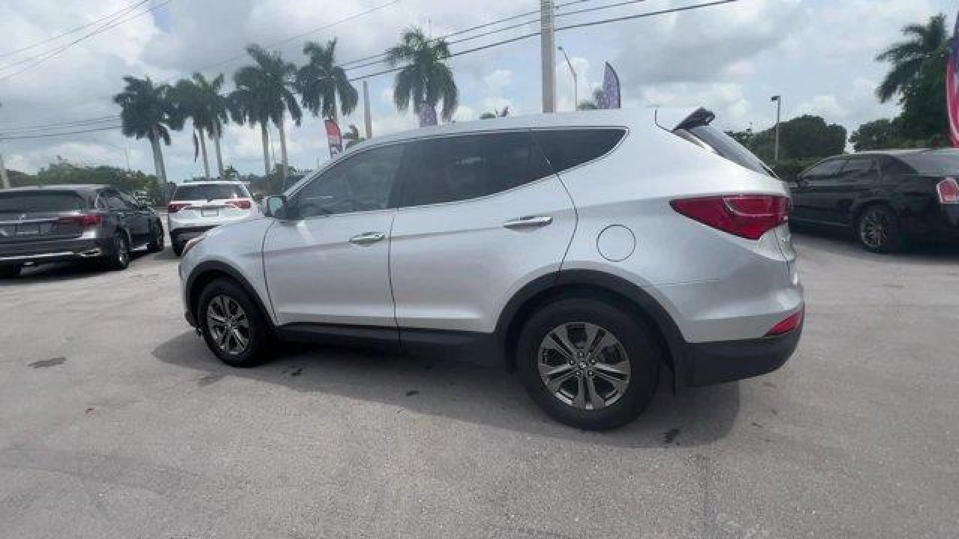 2014 Moonstone Silver /Gray Hyundai Santa Fe Sport Sport 2.4 FWD (5XYZT3LB0EG) with an 4 2.4 L engine, Automatic transmission, located at 27610 S Dixie Hwy, Homestead, FL, 33032, (305) 749-2348, 25.510241, -80.438301 - Boasts 27 Highway MPG and 20 City MPG! This Hyundai Santa Fe Sport delivers a Regular Unleaded I-4 2.4 L/144 engine powering this Automatic transmission. WHEEL LOCKS, REMOTE ENGINE START, OPTION GROUP 01 -inc: standard equipment.*This Hyundai Santa Fe Sport Comes Equipped with These Options *MUDGUAR - Photo#2