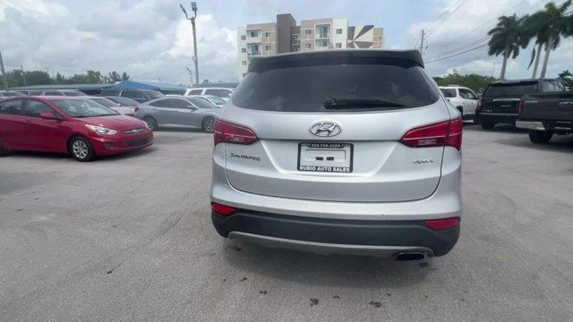 2014 Moonstone Silver /Gray Hyundai Santa Fe Sport Sport 2.4 FWD (5XYZT3LB0EG) with an 4 2.4 L engine, Automatic transmission, located at 27610 S Dixie Hwy, Homestead, FL, 33032, (305) 749-2348, 25.510241, -80.438301 - Boasts 27 Highway MPG and 20 City MPG! This Hyundai Santa Fe Sport delivers a Regular Unleaded I-4 2.4 L/144 engine powering this Automatic transmission. WHEEL LOCKS, REMOTE ENGINE START, OPTION GROUP 01 -inc: standard equipment.*This Hyundai Santa Fe Sport Comes Equipped with These Options *MUDGUAR - Photo#3