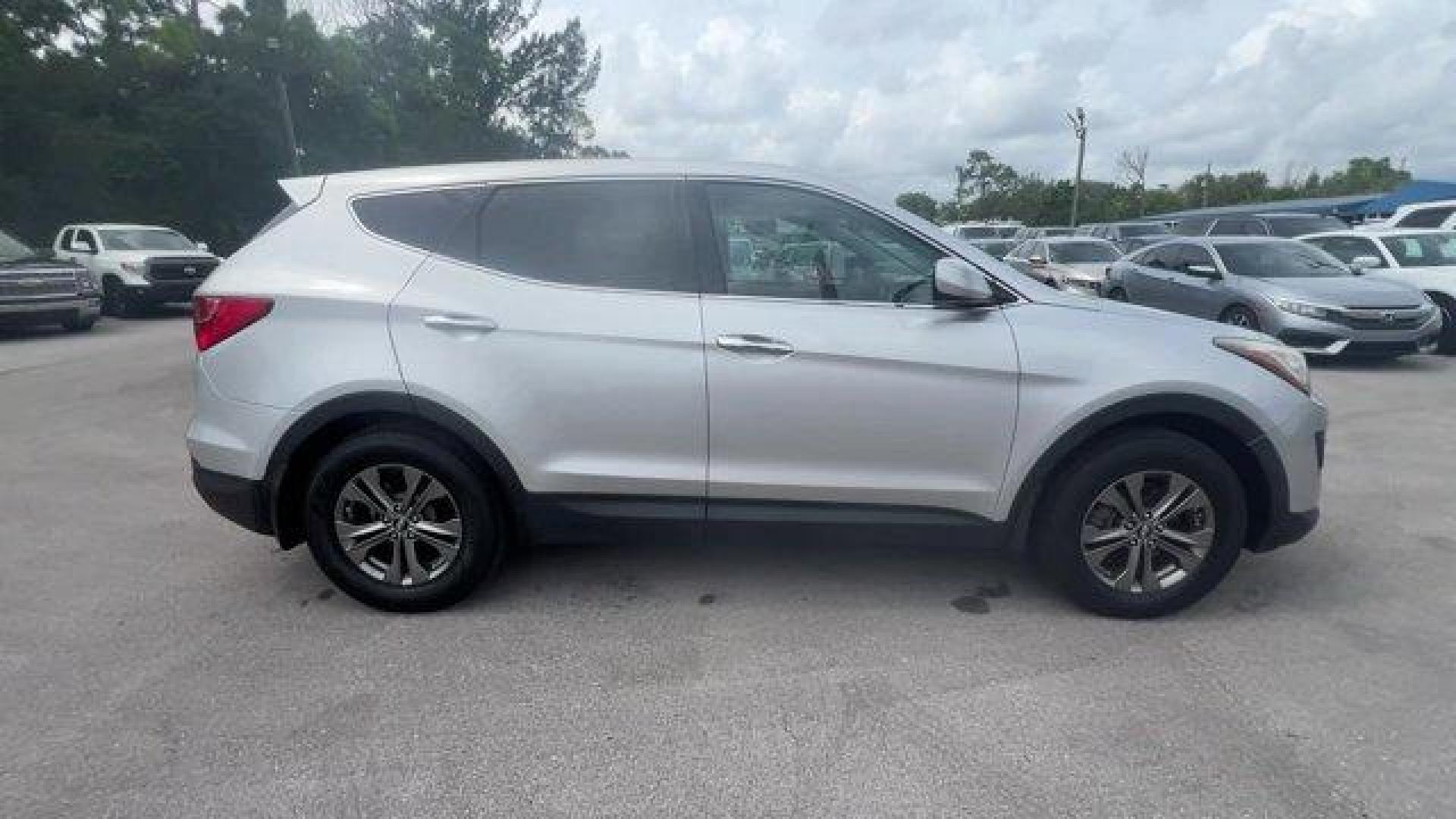 2014 Moonstone Silver /Gray Hyundai Santa Fe Sport Sport 2.4 FWD (5XYZT3LB0EG) with an 4 2.4 L engine, Automatic transmission, located at 27610 S Dixie Hwy, Homestead, FL, 33032, (305) 749-2348, 25.510241, -80.438301 - Boasts 27 Highway MPG and 20 City MPG! This Hyundai Santa Fe Sport delivers a Regular Unleaded I-4 2.4 L/144 engine powering this Automatic transmission. WHEEL LOCKS, REMOTE ENGINE START, OPTION GROUP 01 -inc: standard equipment.*This Hyundai Santa Fe Sport Comes Equipped with These Options *MUDGUAR - Photo#5