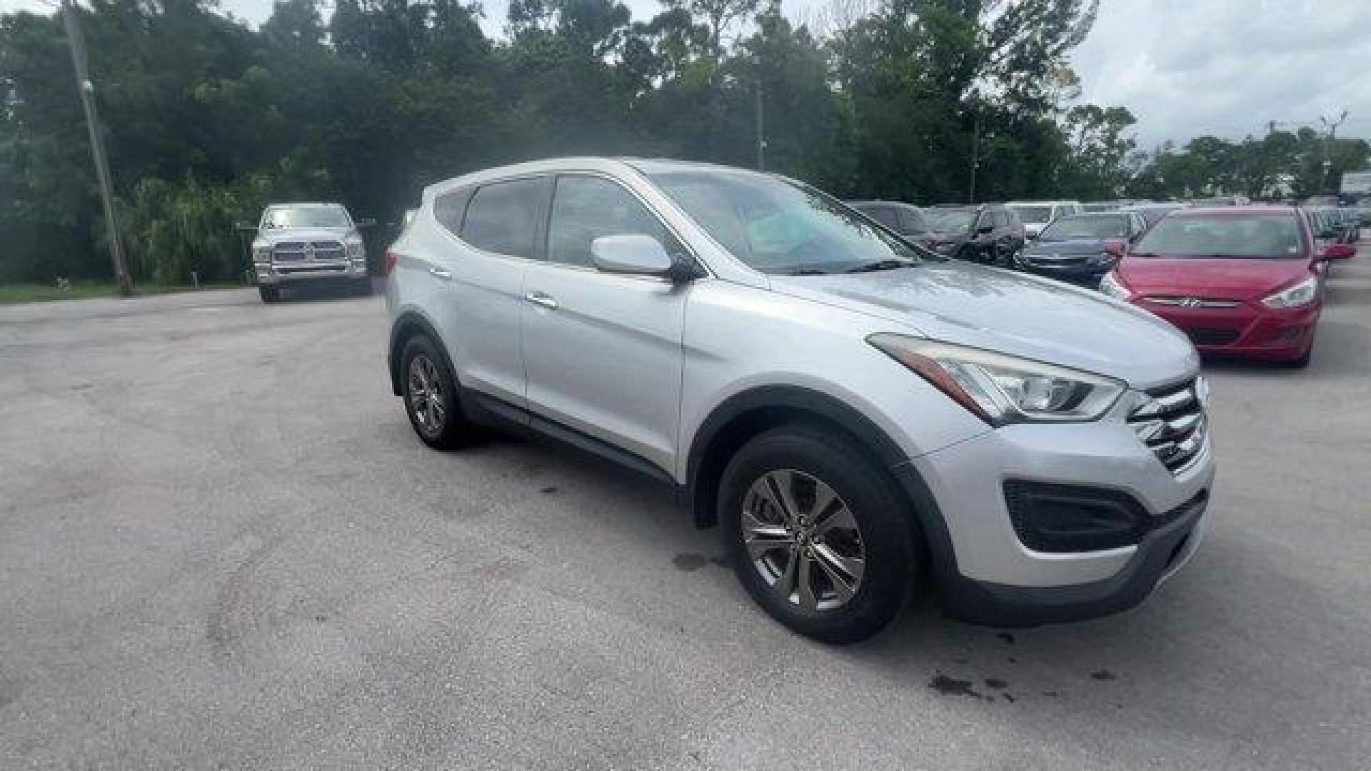 2014 Moonstone Silver /Gray Hyundai Santa Fe Sport Sport 2.4 FWD (5XYZT3LB0EG) with an 4 2.4 L engine, Automatic transmission, located at 27610 S Dixie Hwy, Homestead, FL, 33032, (305) 749-2348, 25.510241, -80.438301 - Boasts 27 Highway MPG and 20 City MPG! This Hyundai Santa Fe Sport delivers a Regular Unleaded I-4 2.4 L/144 engine powering this Automatic transmission. WHEEL LOCKS, REMOTE ENGINE START, OPTION GROUP 01 -inc: standard equipment.*This Hyundai Santa Fe Sport Comes Equipped with These Options *MUDGUAR - Photo#6