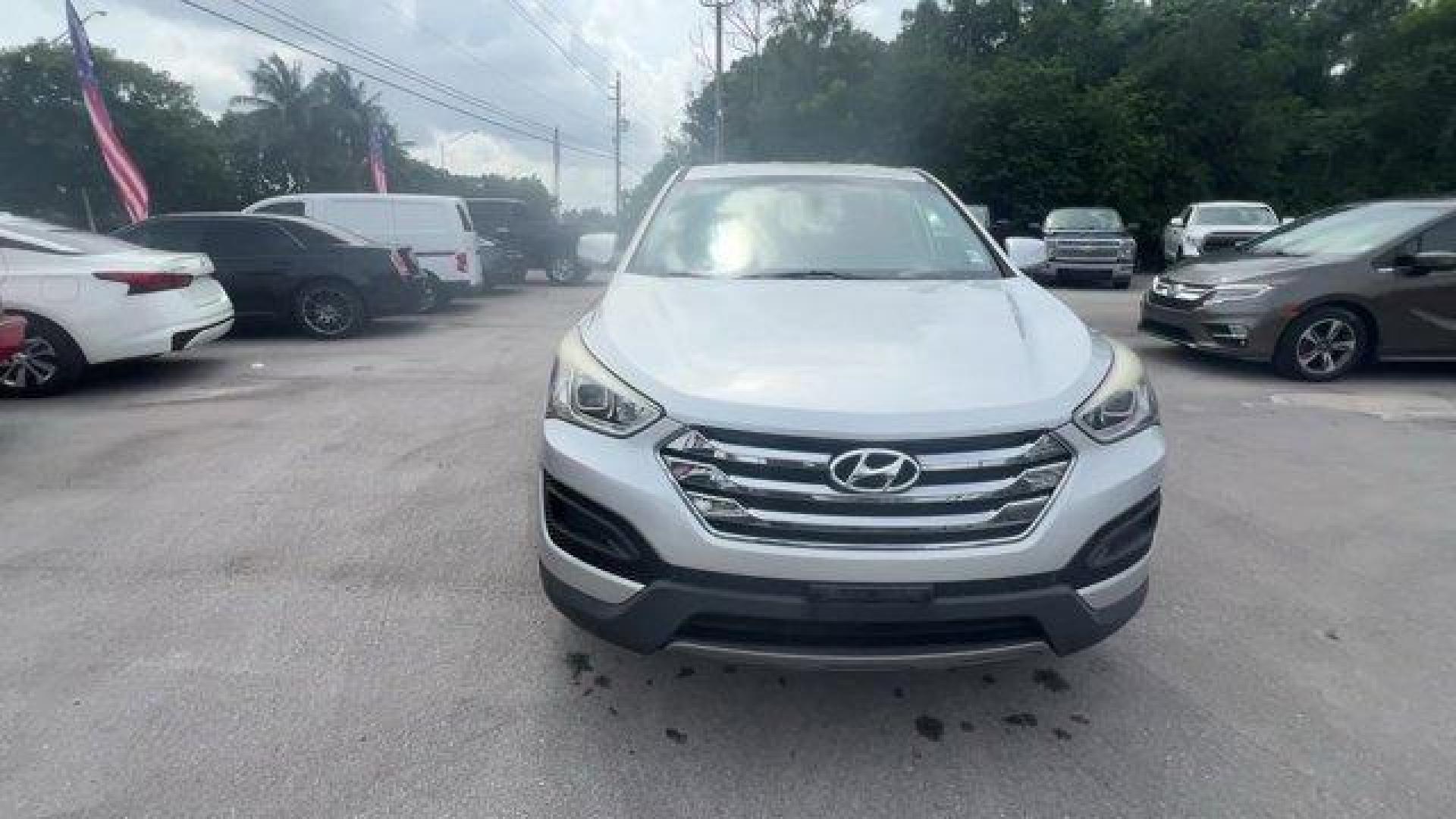 2014 Moonstone Silver /Gray Hyundai Santa Fe Sport Sport 2.4 FWD (5XYZT3LB0EG) with an 4 2.4 L engine, Automatic transmission, located at 27610 S Dixie Hwy, Homestead, FL, 33032, (305) 749-2348, 25.510241, -80.438301 - Boasts 27 Highway MPG and 20 City MPG! This Hyundai Santa Fe Sport delivers a Regular Unleaded I-4 2.4 L/144 engine powering this Automatic transmission. WHEEL LOCKS, REMOTE ENGINE START, OPTION GROUP 01 -inc: standard equipment.*This Hyundai Santa Fe Sport Comes Equipped with These Options *MUDGUAR - Photo#7