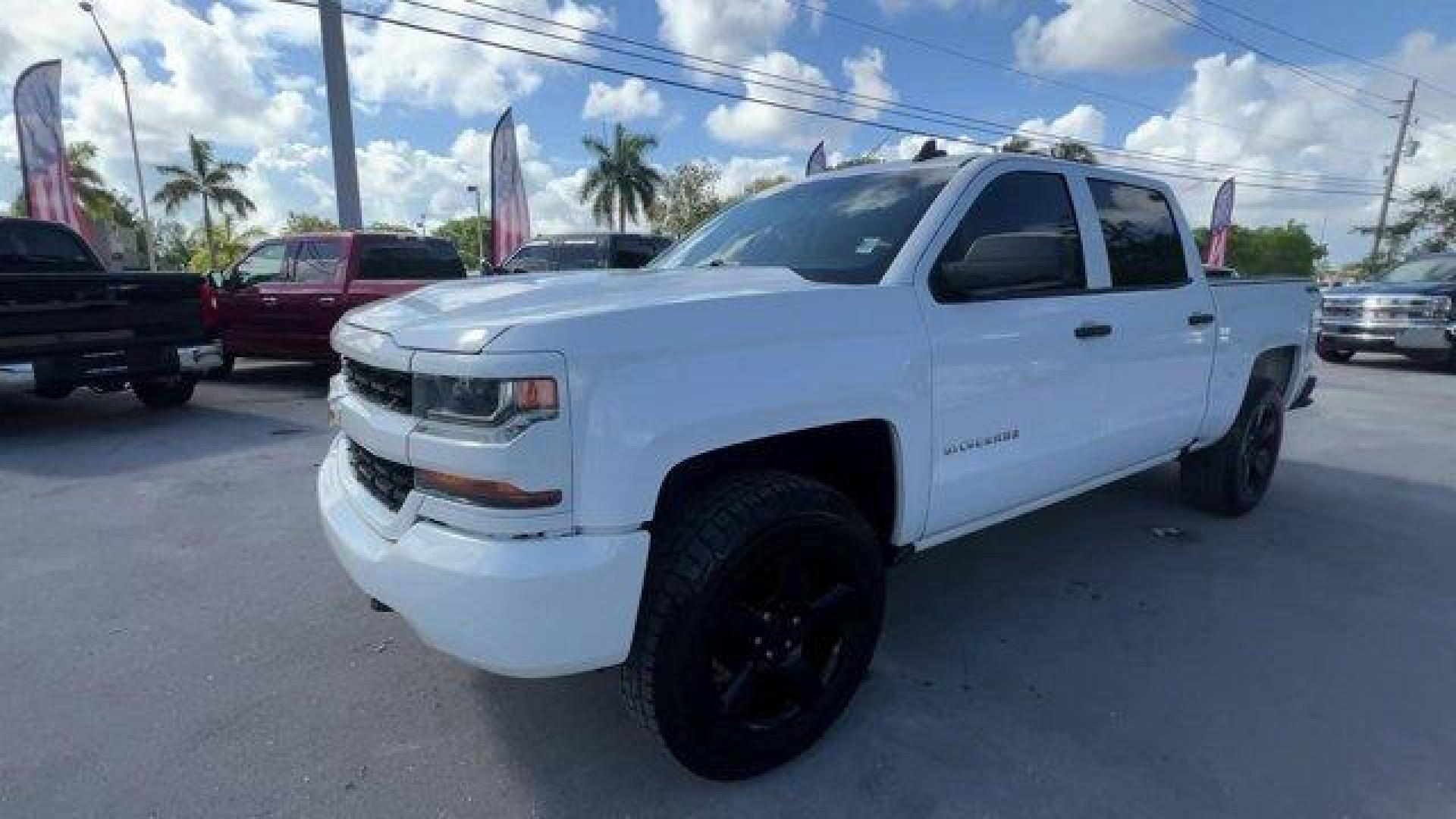 2017 Summit White /Jet Black Chevrolet Silverado 1500 LS Crew Cab Short Box 4WD (3GCUKNEH0HG) with an 6 4.3L engine, Automatic transmission, located at 27610 S Dixie Hwy, Homestead, FL, 33032, (305) 749-2348, 25.510241, -80.438301 - KBB.com 10 Most Awarded Brands. Delivers 22 Highway MPG and 17 City MPG! This Chevrolet Silverado 1500 boasts a Gas/Ethanol V6 4.3L/262 engine powering this Automatic transmission. WHEELS, 17 X 8 (43.2 CM X 20.3 CM) STAINLESS STEEL CLAD (STD), TRANSMISSION, 6-SPEED AUTOMATIC, ELECTRONICALLY CONTROLL - Photo#0