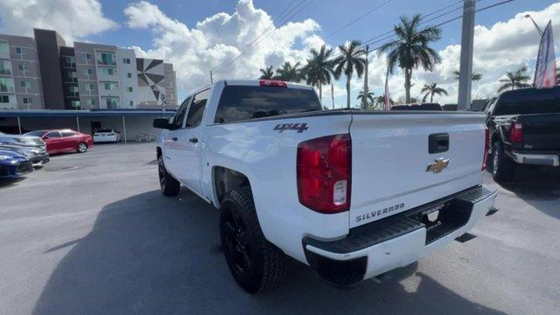2017 Summit White /Jet Black Chevrolet Silverado 1500 LS Crew Cab Short Box 4WD (3GCUKNEH0HG) with an 6 4.3L engine, Automatic transmission, located at 27610 S Dixie Hwy, Homestead, FL, 33032, (305) 749-2348, 25.510241, -80.438301 - KBB.com 10 Most Awarded Brands. Delivers 22 Highway MPG and 17 City MPG! This Chevrolet Silverado 1500 boasts a Gas/Ethanol V6 4.3L/262 engine powering this Automatic transmission. WHEELS, 17 X 8 (43.2 CM X 20.3 CM) STAINLESS STEEL CLAD (STD), TRANSMISSION, 6-SPEED AUTOMATIC, ELECTRONICALLY CONTROLL - Photo#2