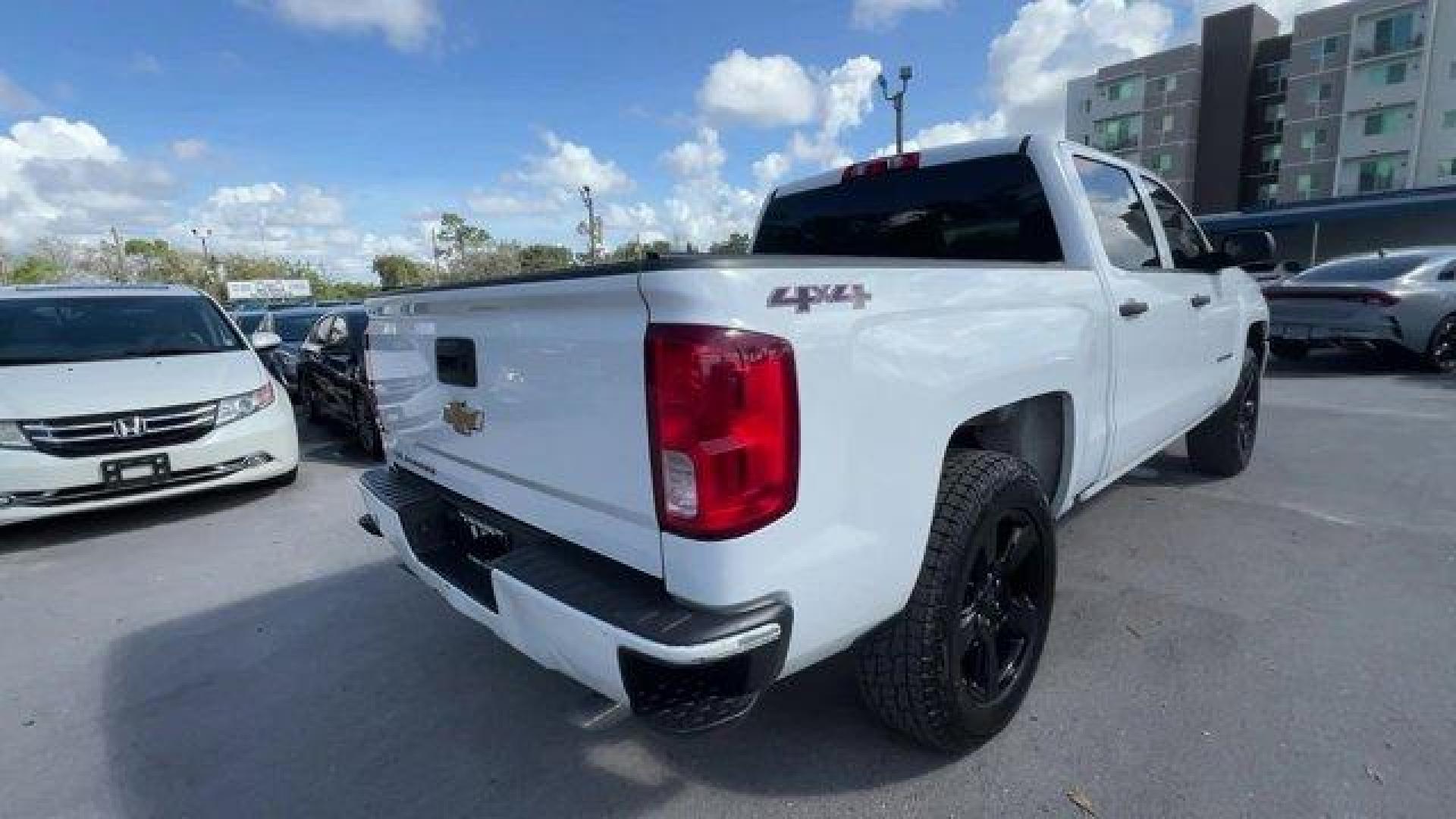 2017 Summit White /Jet Black Chevrolet Silverado 1500 LS Crew Cab Short Box 4WD (3GCUKNEH0HG) with an 6 4.3L engine, Automatic transmission, located at 27610 S Dixie Hwy, Homestead, FL, 33032, (305) 749-2348, 25.510241, -80.438301 - KBB.com 10 Most Awarded Brands. Delivers 22 Highway MPG and 17 City MPG! This Chevrolet Silverado 1500 boasts a Gas/Ethanol V6 4.3L/262 engine powering this Automatic transmission. WHEELS, 17 X 8 (43.2 CM X 20.3 CM) STAINLESS STEEL CLAD (STD), TRANSMISSION, 6-SPEED AUTOMATIC, ELECTRONICALLY CONTROLL - Photo#4