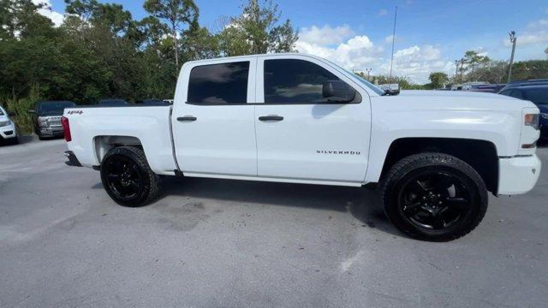 2017 Summit White /Jet Black Chevrolet Silverado 1500 LS Crew Cab Short Box 4WD (3GCUKNEH0HG) with an 6 4.3L engine, Automatic transmission, located at 27610 S Dixie Hwy, Homestead, FL, 33032, (305) 749-2348, 25.510241, -80.438301 - KBB.com 10 Most Awarded Brands. Delivers 22 Highway MPG and 17 City MPG! This Chevrolet Silverado 1500 boasts a Gas/Ethanol V6 4.3L/262 engine powering this Automatic transmission. WHEELS, 17 X 8 (43.2 CM X 20.3 CM) STAINLESS STEEL CLAD (STD), TRANSMISSION, 6-SPEED AUTOMATIC, ELECTRONICALLY CONTROLL - Photo#5