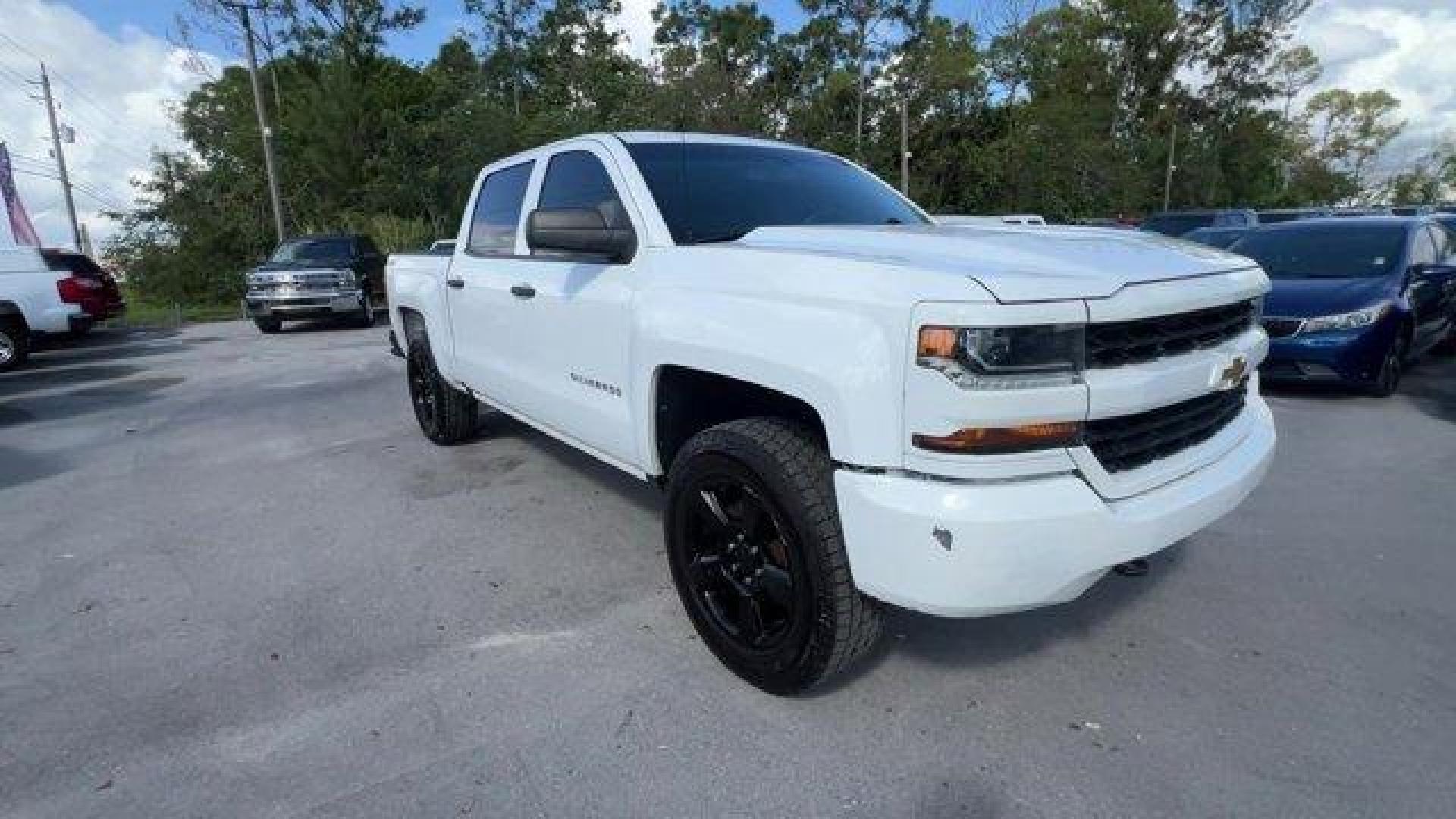 2017 Summit White /Jet Black Chevrolet Silverado 1500 LS Crew Cab Short Box 4WD (3GCUKNEH0HG) with an 6 4.3L engine, Automatic transmission, located at 27610 S Dixie Hwy, Homestead, FL, 33032, (305) 749-2348, 25.510241, -80.438301 - KBB.com 10 Most Awarded Brands. Delivers 22 Highway MPG and 17 City MPG! This Chevrolet Silverado 1500 boasts a Gas/Ethanol V6 4.3L/262 engine powering this Automatic transmission. WHEELS, 17 X 8 (43.2 CM X 20.3 CM) STAINLESS STEEL CLAD (STD), TRANSMISSION, 6-SPEED AUTOMATIC, ELECTRONICALLY CONTROLL - Photo#6