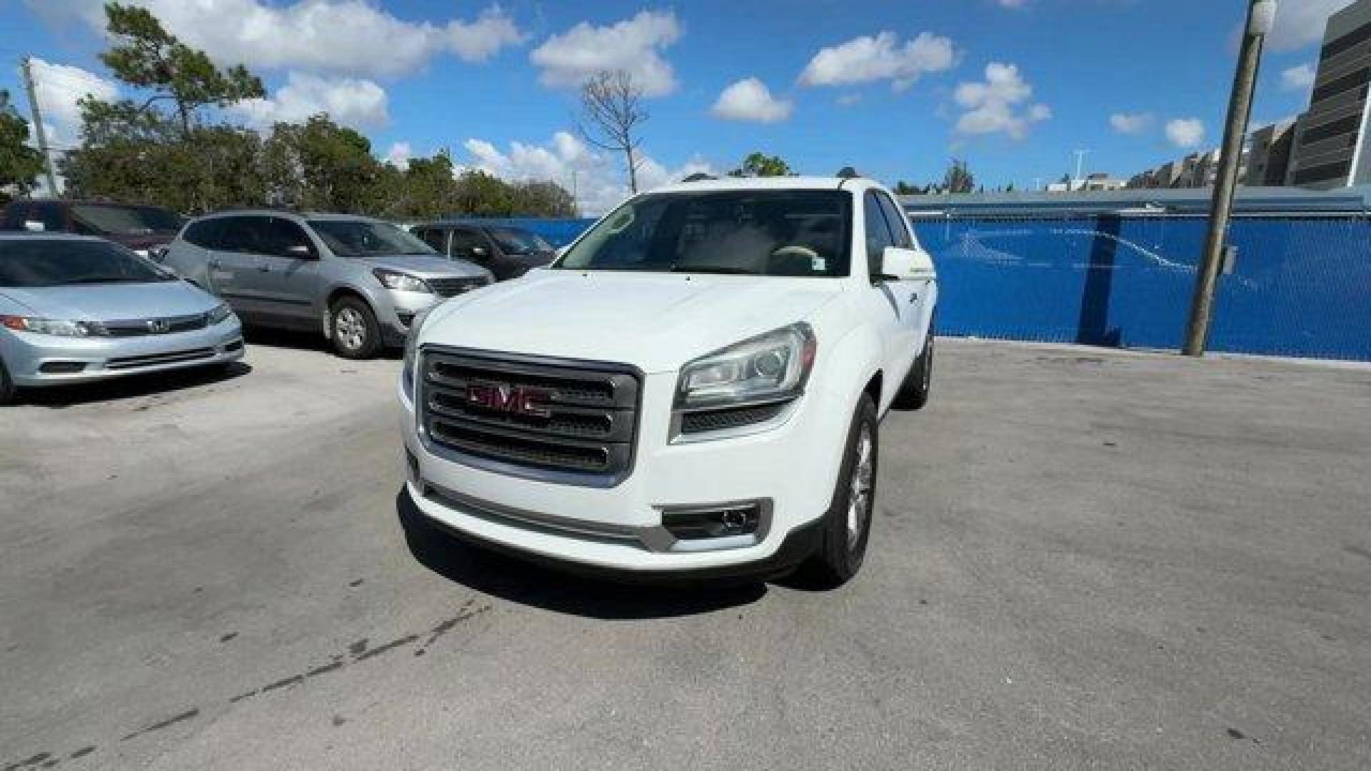 2016 Summit White /Dark Cashmere GMC Acadia SLT-1 (1GKKRRKDXGJ) with an 6 3.6L engine, Automatic transmission, located at 27610 S Dixie Hwy, Homestead, FL, 33032, (305) 749-2348, 25.510241, -80.438301 - KBB.com Brand Image Awards. Delivers 22 Highway MPG and 15 City MPG! This GMC Acadia delivers a Gas V6 3.6L/217 engine powering this Automatic transmission. WHEELS, 4 - 19 X 7.5 (48.3 CM X 19.1 CM) ALUMINUM (STD), TRANSMISSION, 6-SPEED AUTOMATIC (STD), TIRES, P255/60R19 H-RATED, BLACKWALL (STD).*Thi - Photo#0