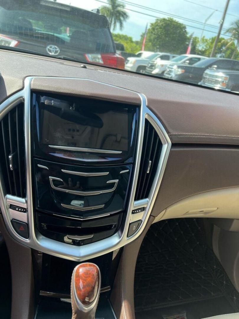 2016 Platinum Ice Tricoat /Shale With Brownstone Accents Cadillac SRX Luxury (3GYFNBE30GS) with an 3.6L V6 DGI DOHC VVT engine, Automatic transmission, located at 27610 S Dixie Hwy, Homestead, FL, 33032, (305) 749-2348, 25.510241, -80.438301 - Photo#7