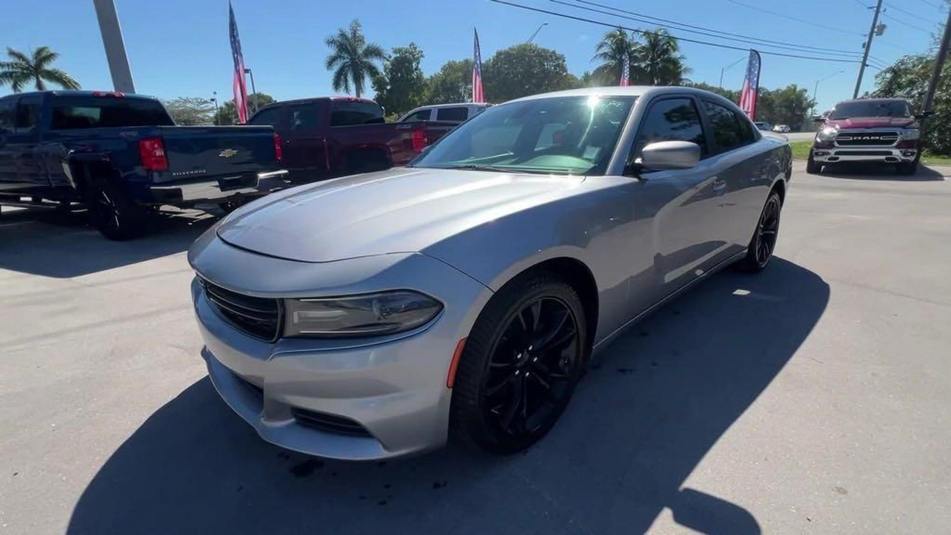 2016 Billet Silver Metallic Clearcoat /Black Dodge Charger SXT (2C3CDXHG4GH) with an 3.6L 6-Cylinder SMPI DOHC engine, Automatic transmission, located at 27610 S Dixie Hwy, Homestead, FL, 33032, (305) 749-2348, 25.510241, -80.438301 - Photo#0