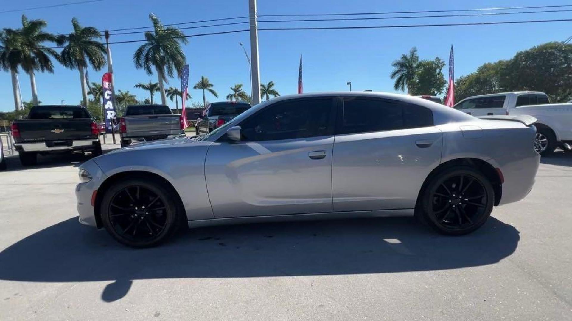 2016 Billet Silver Metallic Clearcoat /Black Dodge Charger SXT (2C3CDXHG4GH) with an 3.6L 6-Cylinder SMPI DOHC engine, Automatic transmission, located at 27610 S Dixie Hwy, Homestead, FL, 33032, (305) 749-2348, 25.510241, -80.438301 - Photo#1