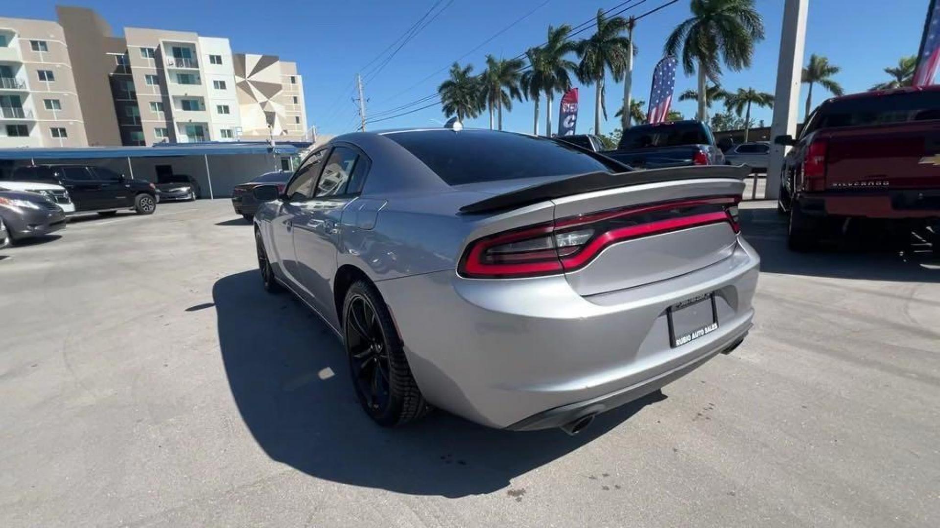 2016 Billet Silver Metallic Clearcoat /Black Dodge Charger SXT (2C3CDXHG4GH) with an 3.6L 6-Cylinder SMPI DOHC engine, Automatic transmission, located at 27610 S Dixie Hwy, Homestead, FL, 33032, (305) 749-2348, 25.510241, -80.438301 - Photo#2